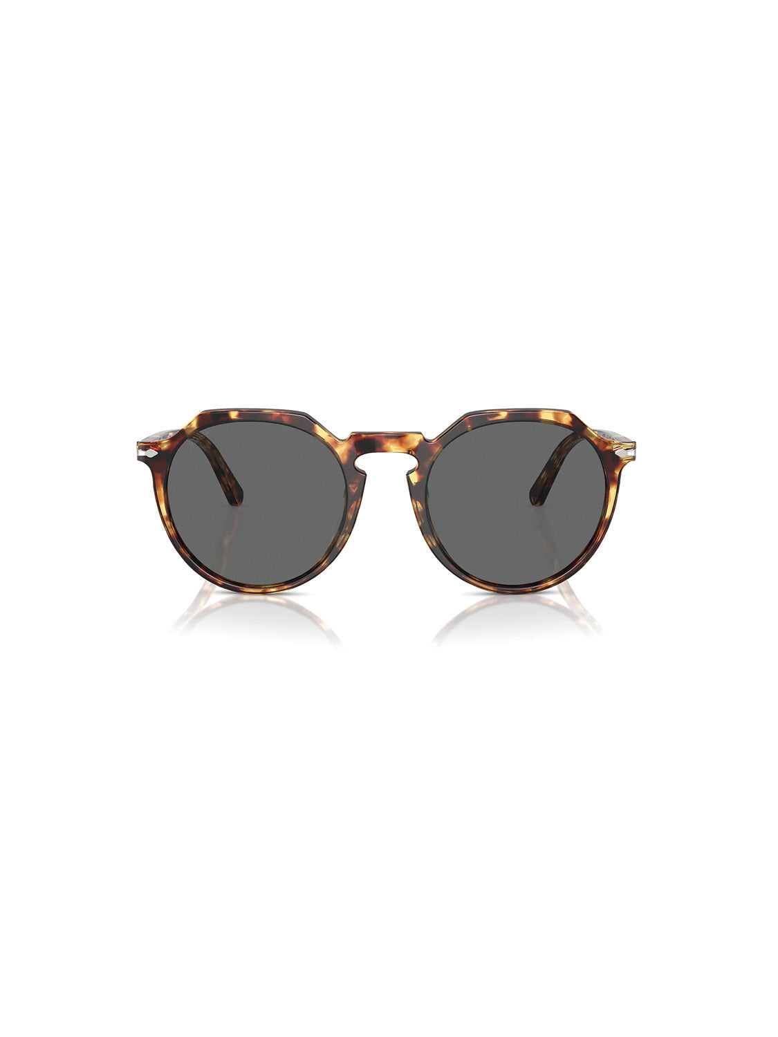 The Persol - PO3281 round sunglasses feature tortoiseshell acetate frames and dark lenses, set against a white background. The design includes subtle, stylish temple detailing reminiscent of classic Persol vintage style.