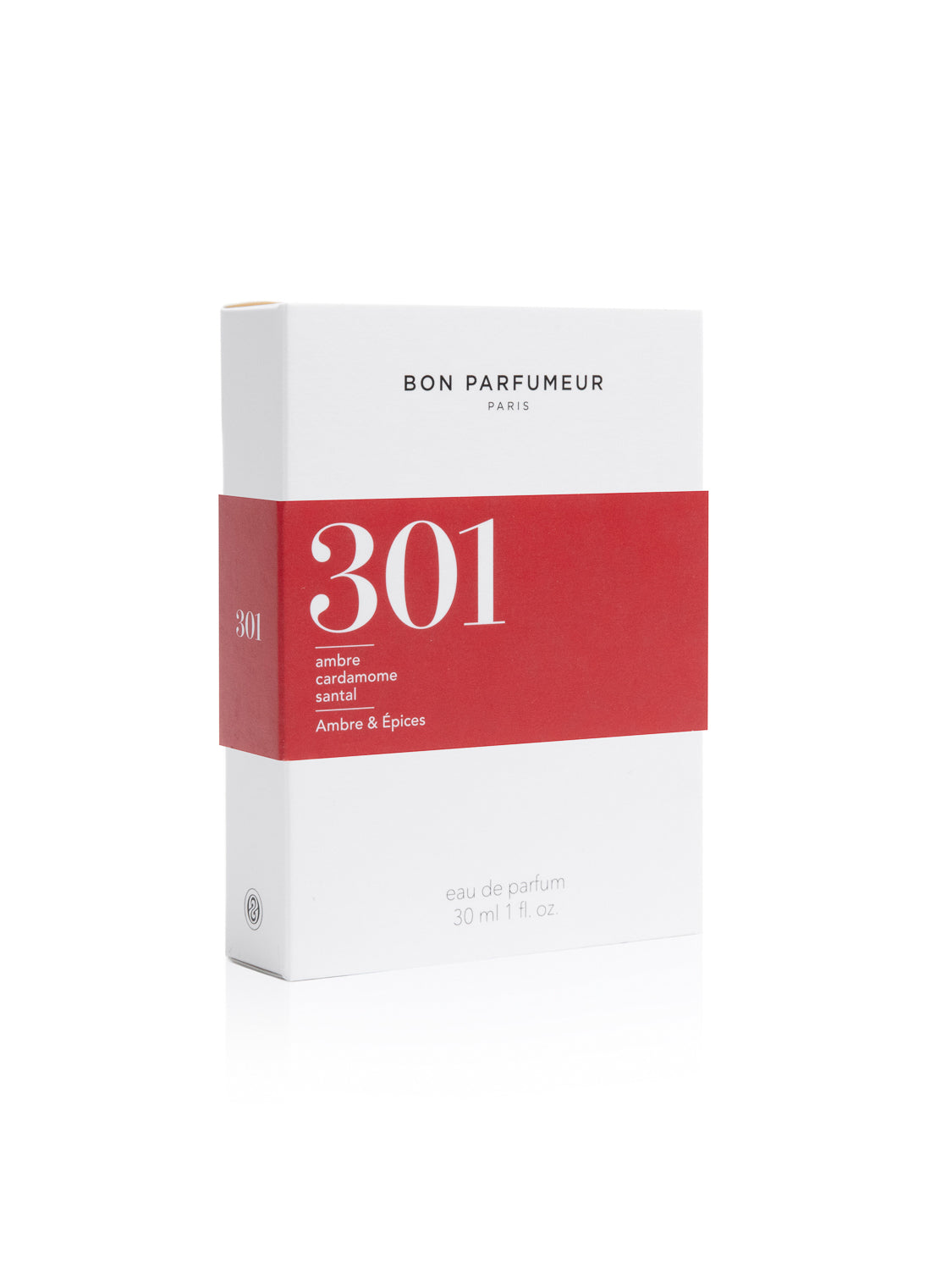 The Bon Parfumeur - 301 perfume comes in a white box with red accents, offering spicy amber aromas. The label highlights cardamom and sandalwood notes. It contains 30 ml (1 fl. oz) of eau de parfum.