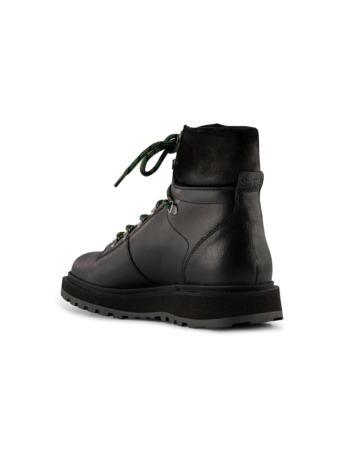 The Kite Hiker Warm Boot by Shoe The Bear is a black leather winter boot featuring LWG-waxed leather, green laces, dark metal eyelets, high ankle support, and a thick treaded sole. Its sturdy design and minimalist style exude hiking-inspired confidence when viewed from the back angle.