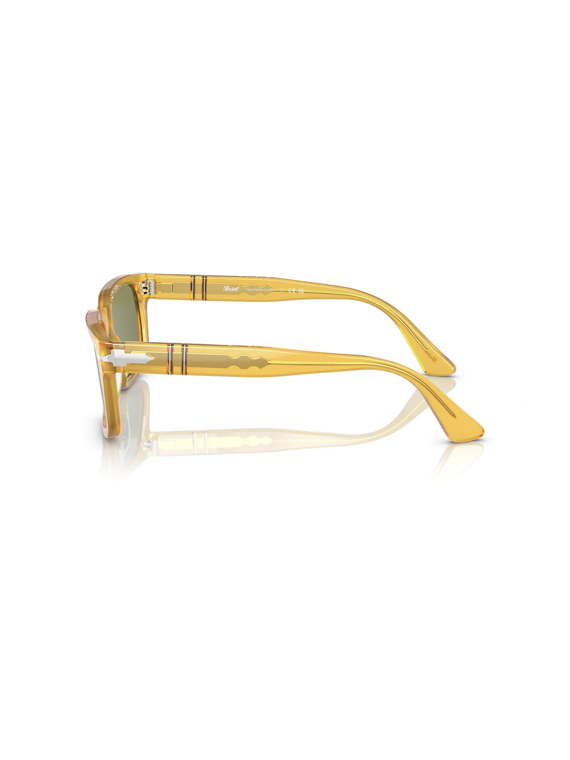 The Persol - PO3272 features a retro D-frame silhouette with transparent yellow frames. It includes the Meflecto system and subtle decorative details on the arms. The tinted lenses of these sunglasses rest beautifully on a white reflective surface.