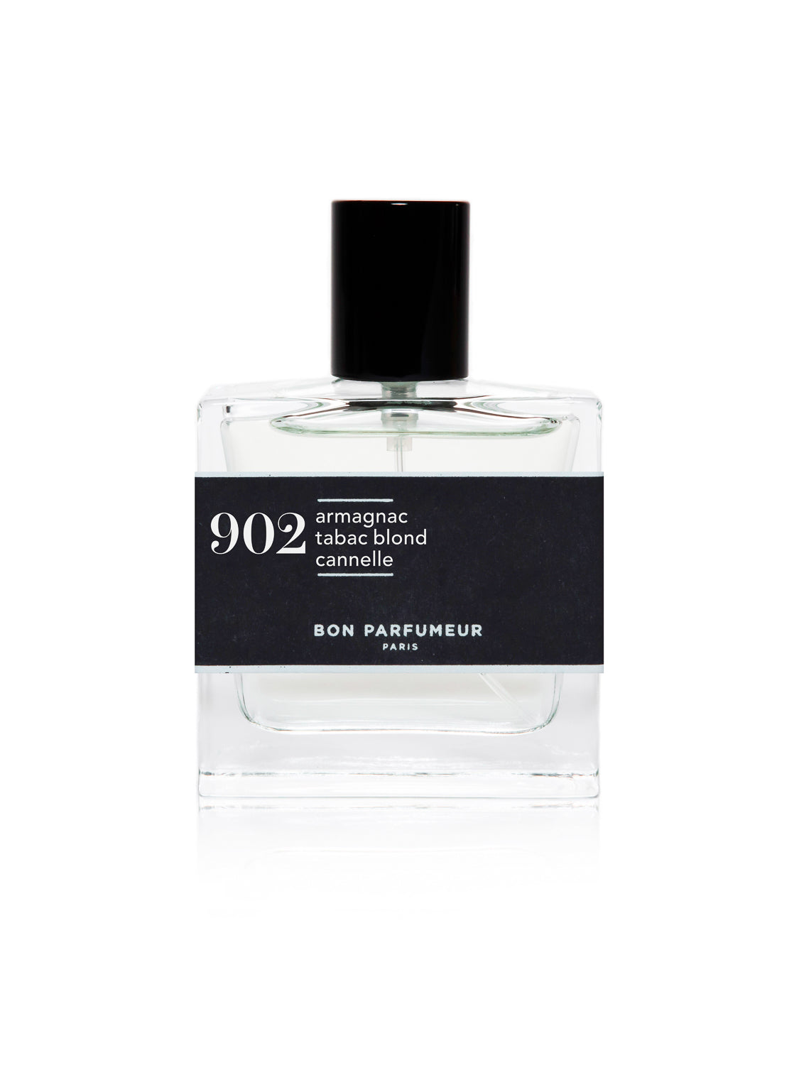 The elegant clear square bottle of Bon Parfumeur - 902 features a black cap and label. The white text on the label states Armagnac, Tabac Blond, Cannelle along with Bon Parfumeur Paris, presenting a cruelty-free fragrance with light-colored liquid inside.