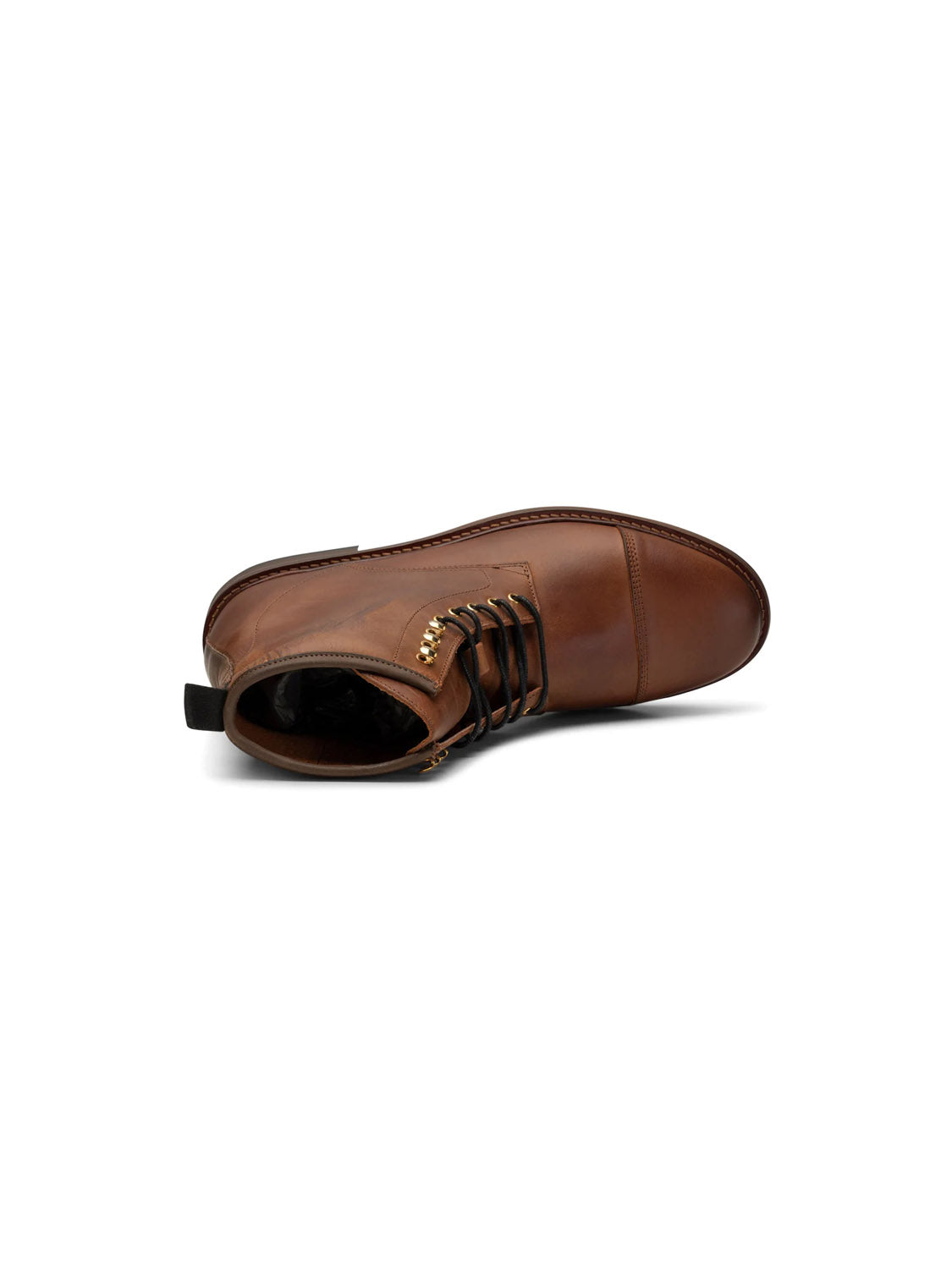 The Curtis Hand Crafted Lace-Up Leather Boots by Shoe The Bear are shown in profile, featuring a Portuguese handcrafted design, brown leather with intricate stitching, and dark laces through gold eyelets. The boots have a round toe and pull tab, finished with an LWG certified leather sole.