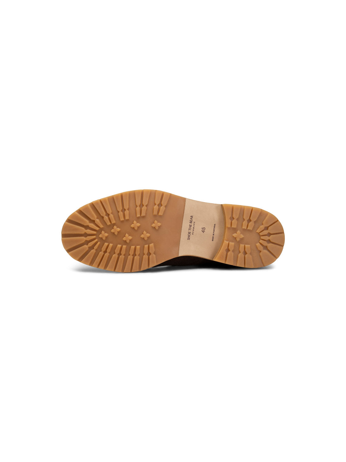 The sole of the York Suede Lace Up Boot by Shoe The Bear, crafted in Portugal, features a thick rubber tread with star patterns and rectangular grooves, while the stamped middle section reflects detailed LWG-certified suede craftsmanship.