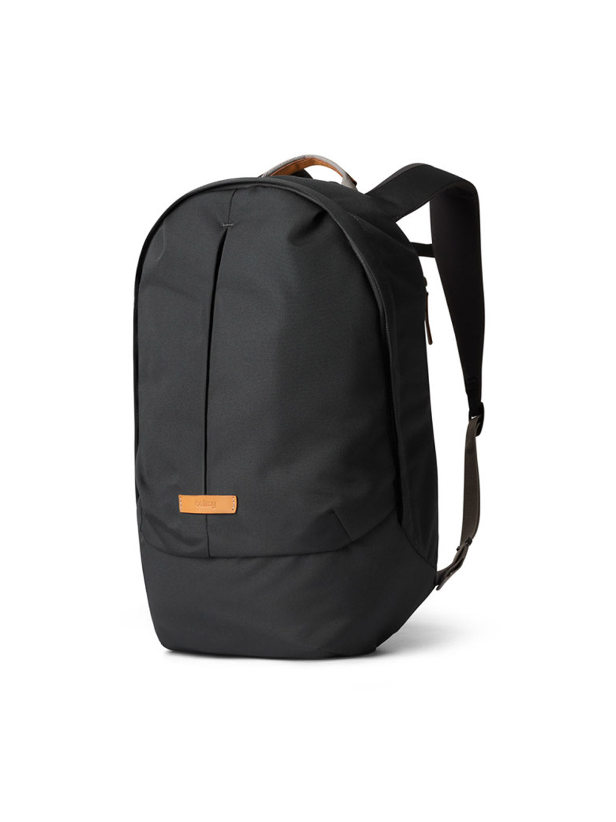 The Bellroy Classic Backpack Plus - 24L is a sleek, black laptop backpack with a minimalist design, crafted from water-resistant recycled fabric with a brown leather front accent and top handle, shown against a white background.