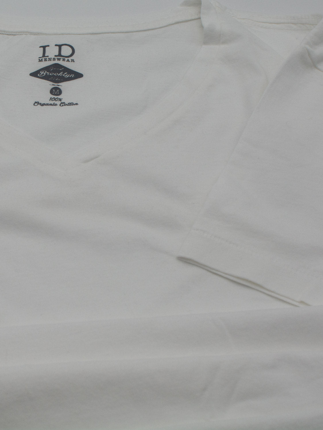 Legacy Organic Cotton V Neck Tee by ID Menswear, featuring a classic fit and crafted from organic cotton, displayed on a flat surface.