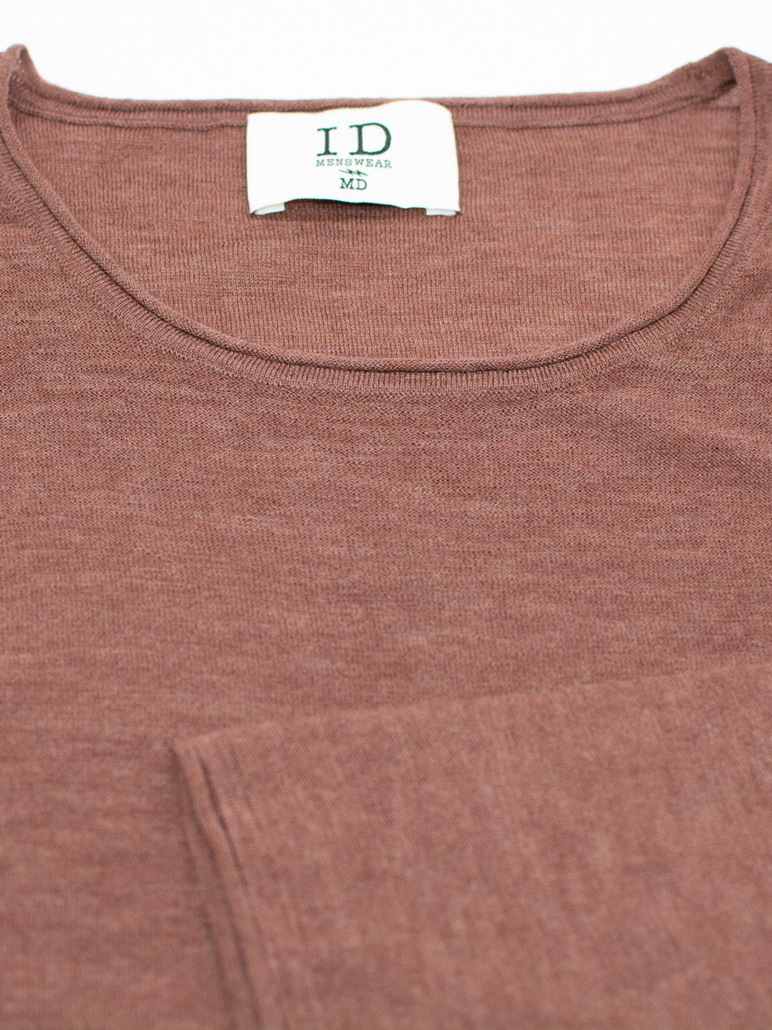 The Vogue Lightweight Merino Sweater by ID Menswear is a brown mens shirt with a rounded neckline and front pocket, featuring a reverse knit design. Made from extra fine Merino wool, it offers a soft and slightly textured finish.