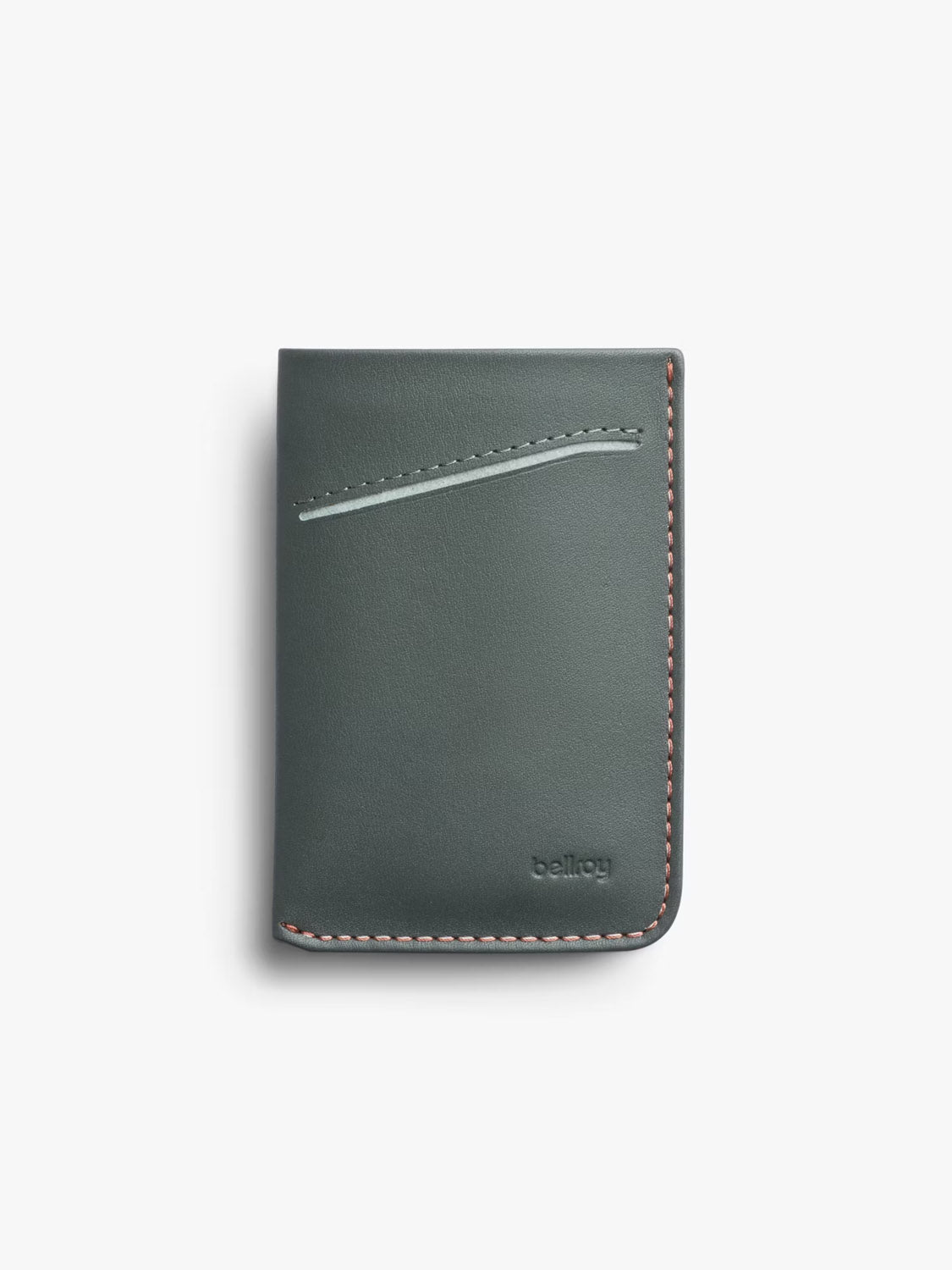 The Bellroy Card Sleeve Wallet is a minimalist dark green leather card holder with beige stitching, a diagonal outer pocket, and Bellroy embossed in the bottom right corner, shown against a plain light background.