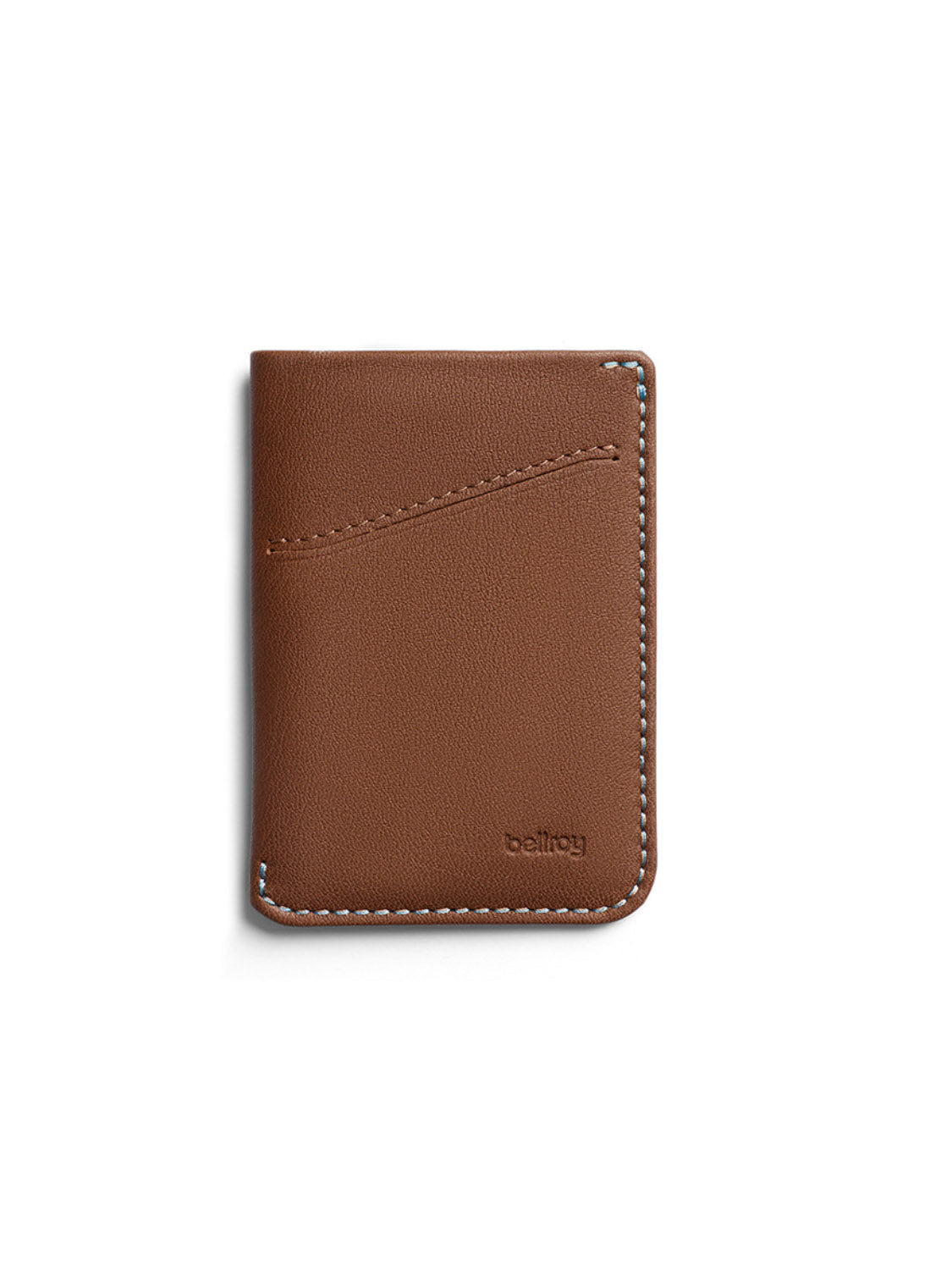 The Bellroy Card Sleeve Wallet is a slim, brown leather card holder with white-stitched edges and a diagonal front slot. The Bellroy logo is embossed in the lower right corner, making it an ideal minimalist wallet for daily use.
