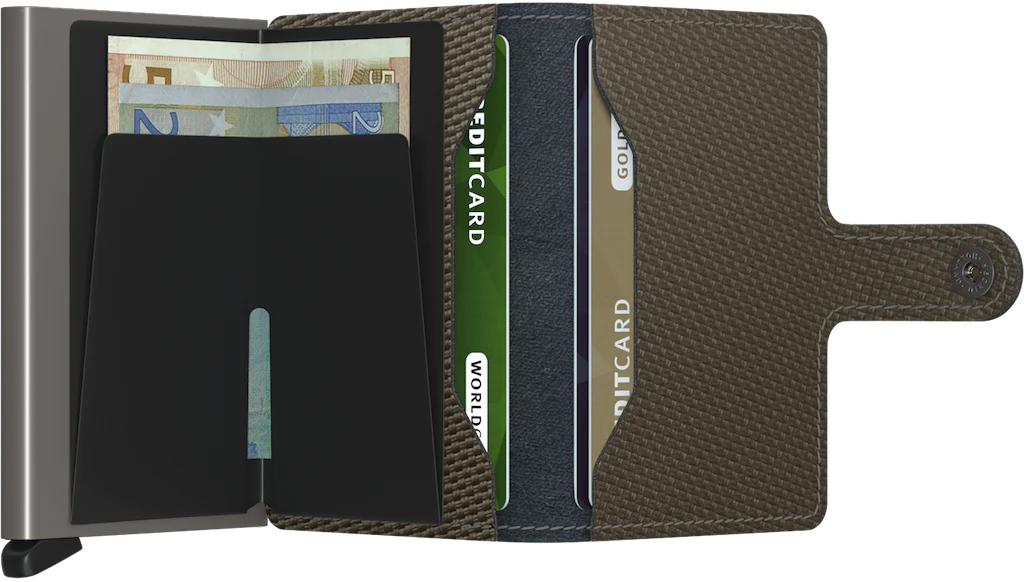 The Secrid Miniwallet Carbon Weave Pattern Leather is an open, brown textured compact wallet with compartments showing Euro banknotes and two credit cards, featuring a right-side button closure flap for style and security.