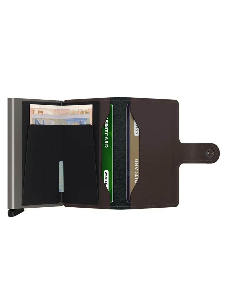 The Secrid Miniwallet Matte Finish Leather is a stylish, compact wallet with a snap button, featuring organized compartments for cards and euro banknotes—ideal for combining elegance and practicality.