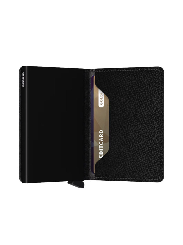 The Secrid Slimwallet Crisple, a slim leather wallet, is open with two credit cards partially visible in its slot against a plain white background.