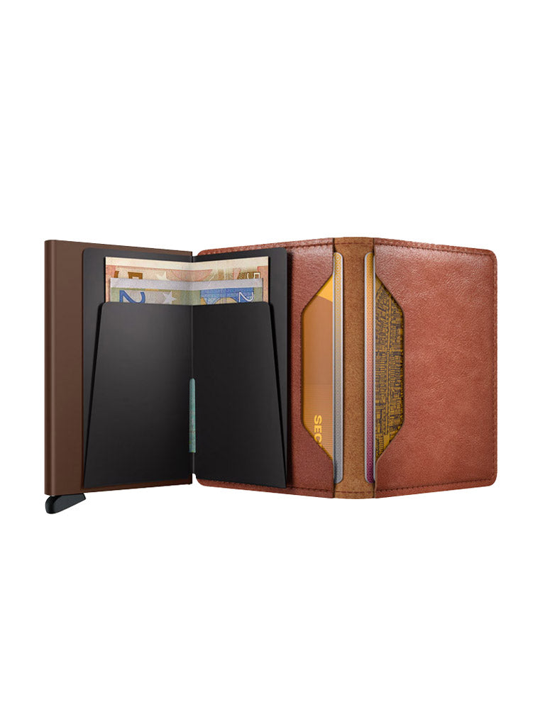 The Secrid Slimwallet Vintage Leather by Secrid is open on a white background, displaying cash, cards, and a black metal cardholder insert with RFID/NFC security.
