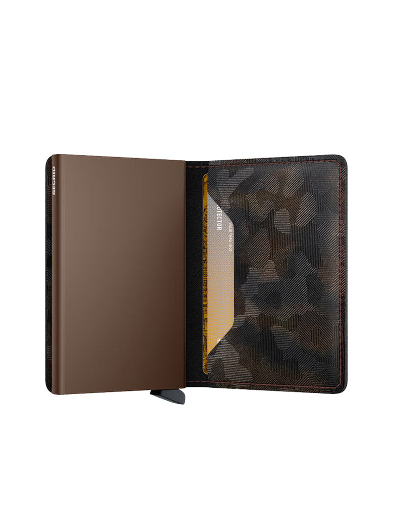 The Secrid Slimwallet Jungle by Secrid features an open design with a brown European leather interior, a card slot for one card on the right, a sleek, minimalist style, and a subtle dark patterned lining.
