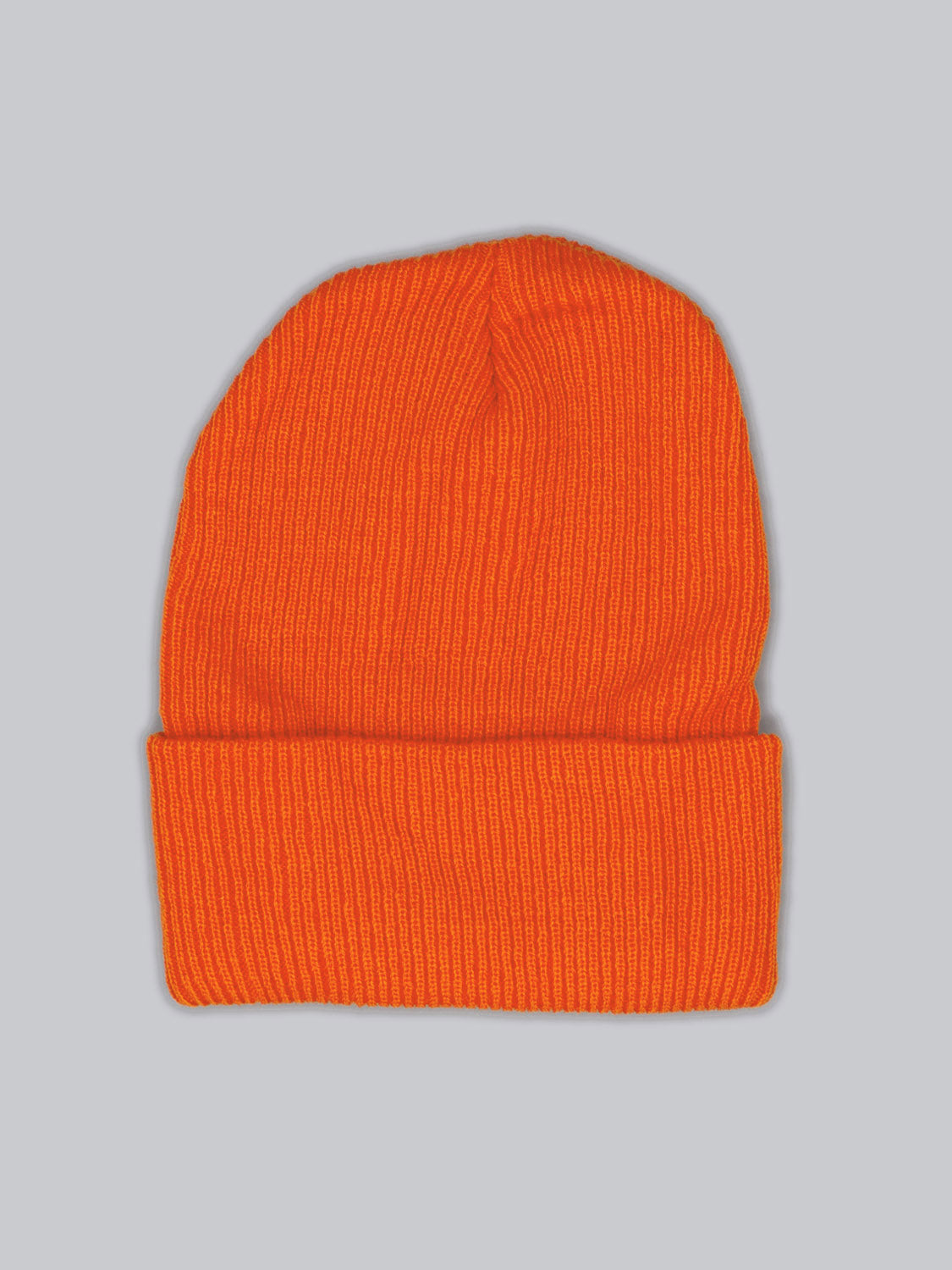The Yonker Ribbed Acrylic Beanie by ID Menswear, a vibrant orange rib-knit hat featuring a folded brim and crafted from soft acrylic, rests on a gray background.
