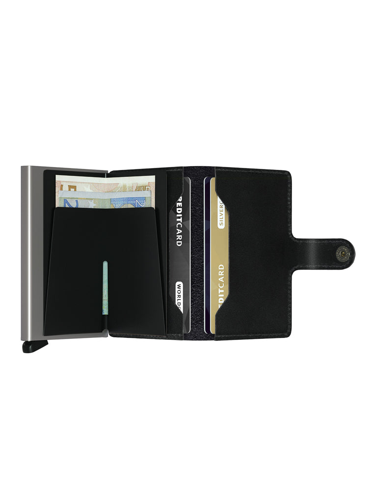The Secrid Miniwallet Original by Secrid is an open black leather wallet with euro notes and cards visible, featuring a snap-button closure—combining style, RFID protection, and everyday convenience.