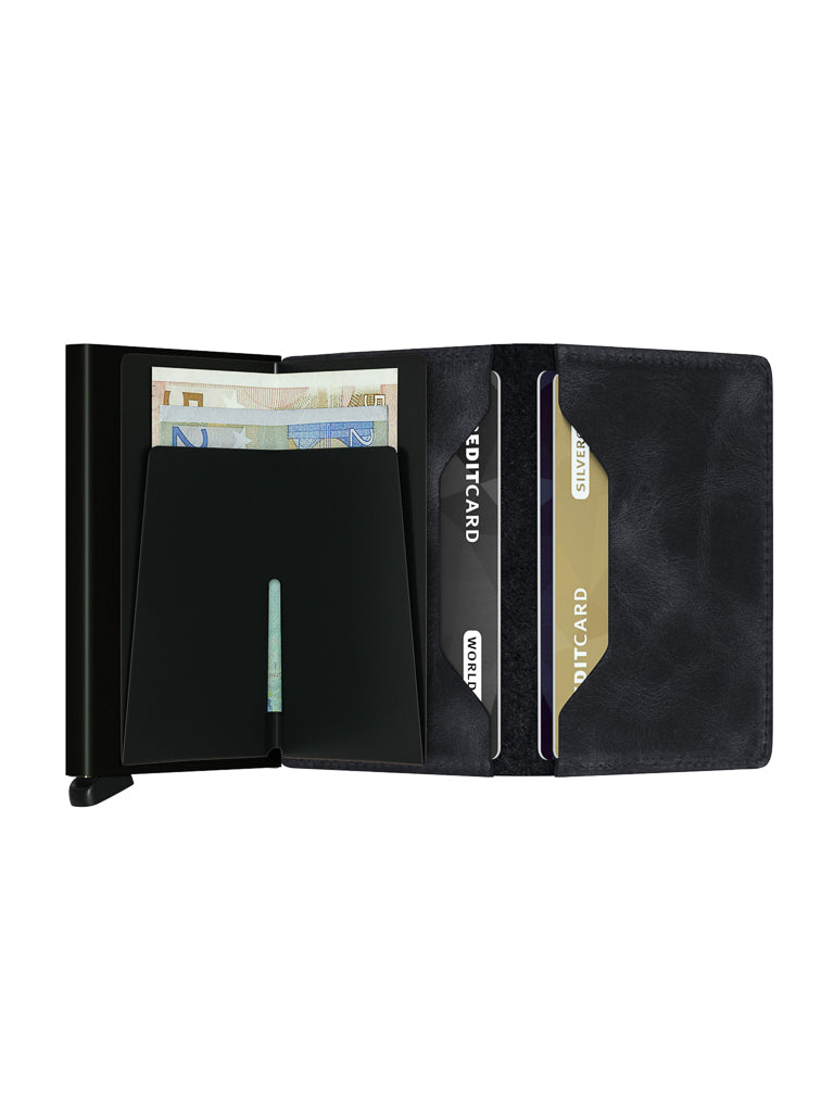 The Secrid Slimwallet Vintage Leather is a slim black leather wallet with RFID protection, shown open against a white background displaying euro banknotes and three cards labeled CREDITCARD and GOLD CARD in its card slots.