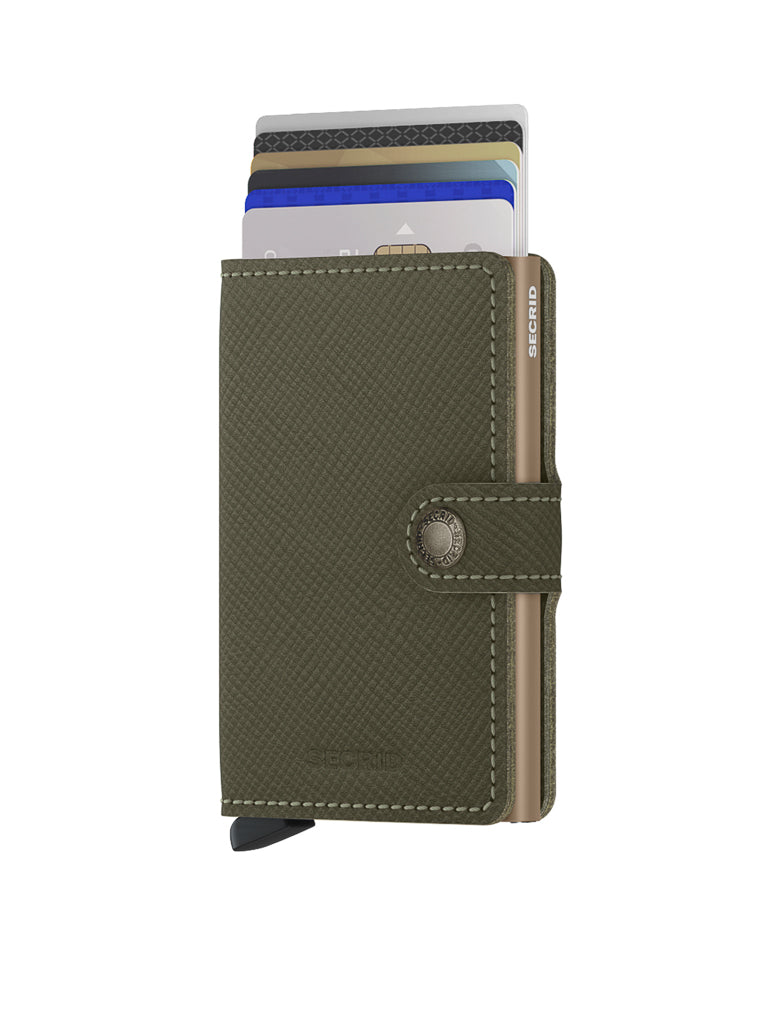 The Secrid Miniwallet Saffiano Leather in olive green features textured leather, a snap closure, white stitching, visible card slots at the top, SECRID branding on the side, and RFID protection for your credit cards.