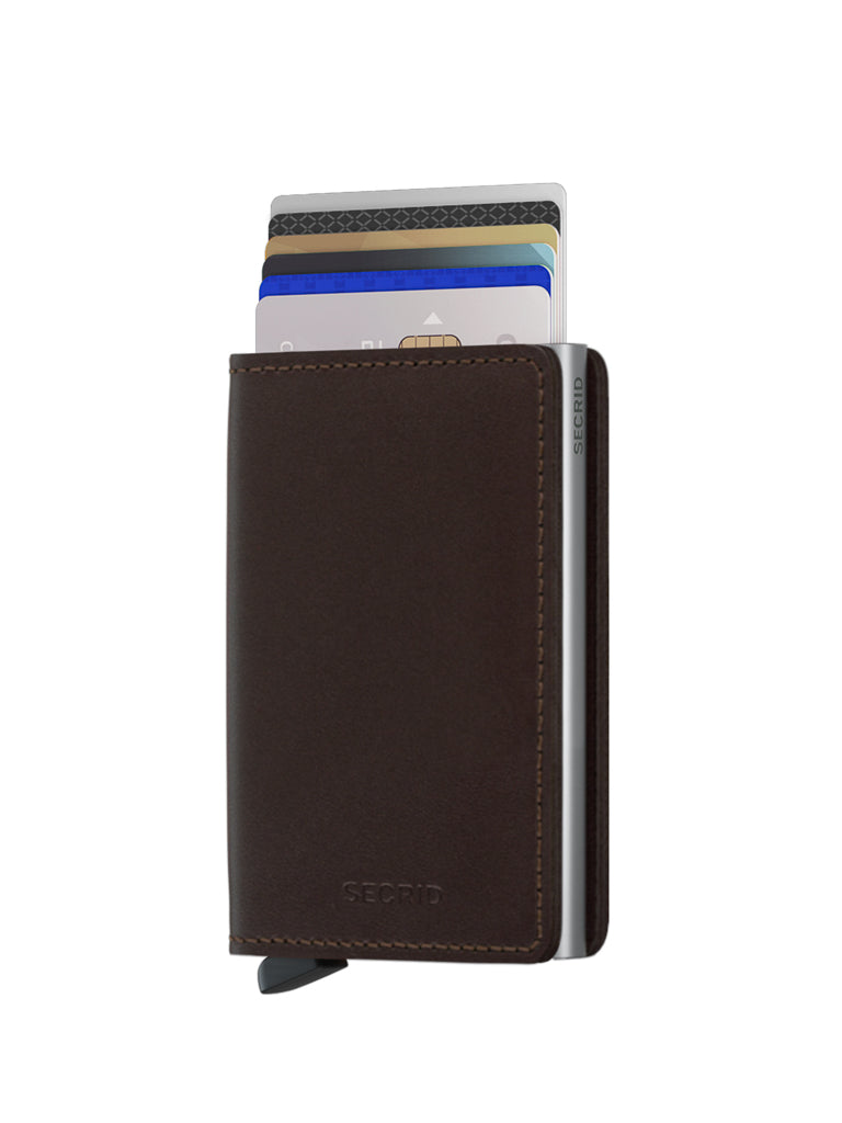 The Secrid Slimwallet Original, made from sleek European leather, stands upright with several credit cards partially extended against a white background, highlighting its RFID protection.
