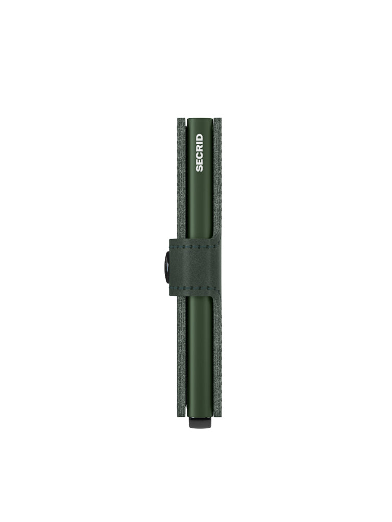 The Secrid Miniwallet Original by Secrid appears closed and upright with a matching green strap and button, set against a white background—ideal for anyone seeking compact wallet design and RFID protection.