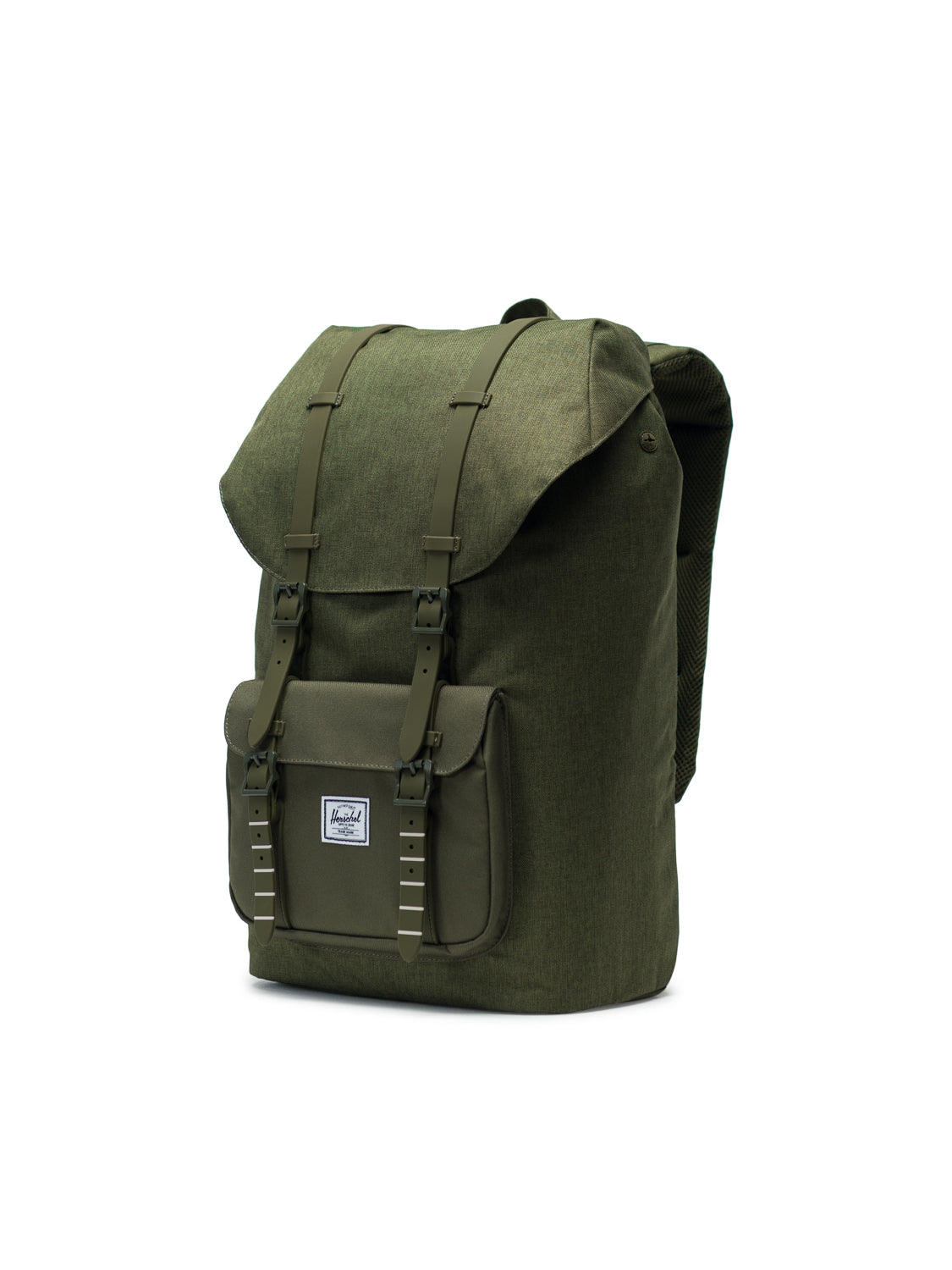 A green Herschel Little America Iconic Backpack featuring a flap top, two buckle straps, front pocket, and small white logo patch stands upright on a white background.