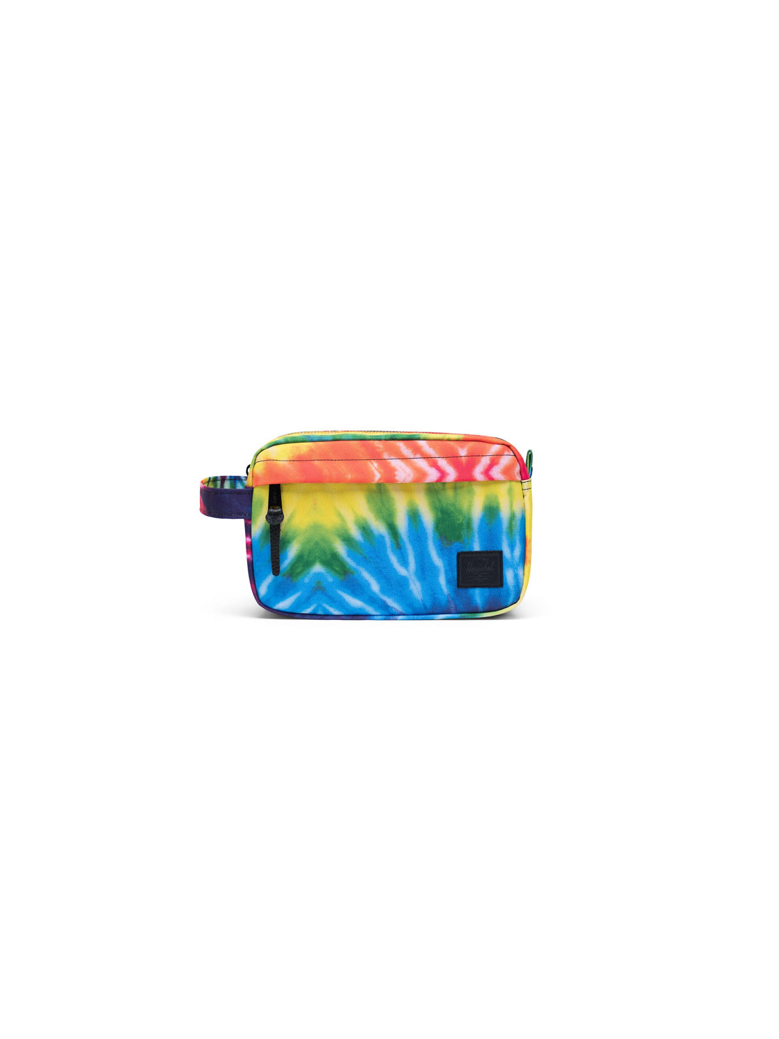 The Herschel Chapter Carry-On Travel Kit is a compact bag with a vibrant blue, yellow, red, and green tie-dye pattern, side handle, waterproof top zipper, small front zip pocket, and black patch—ideal for travel essentials.