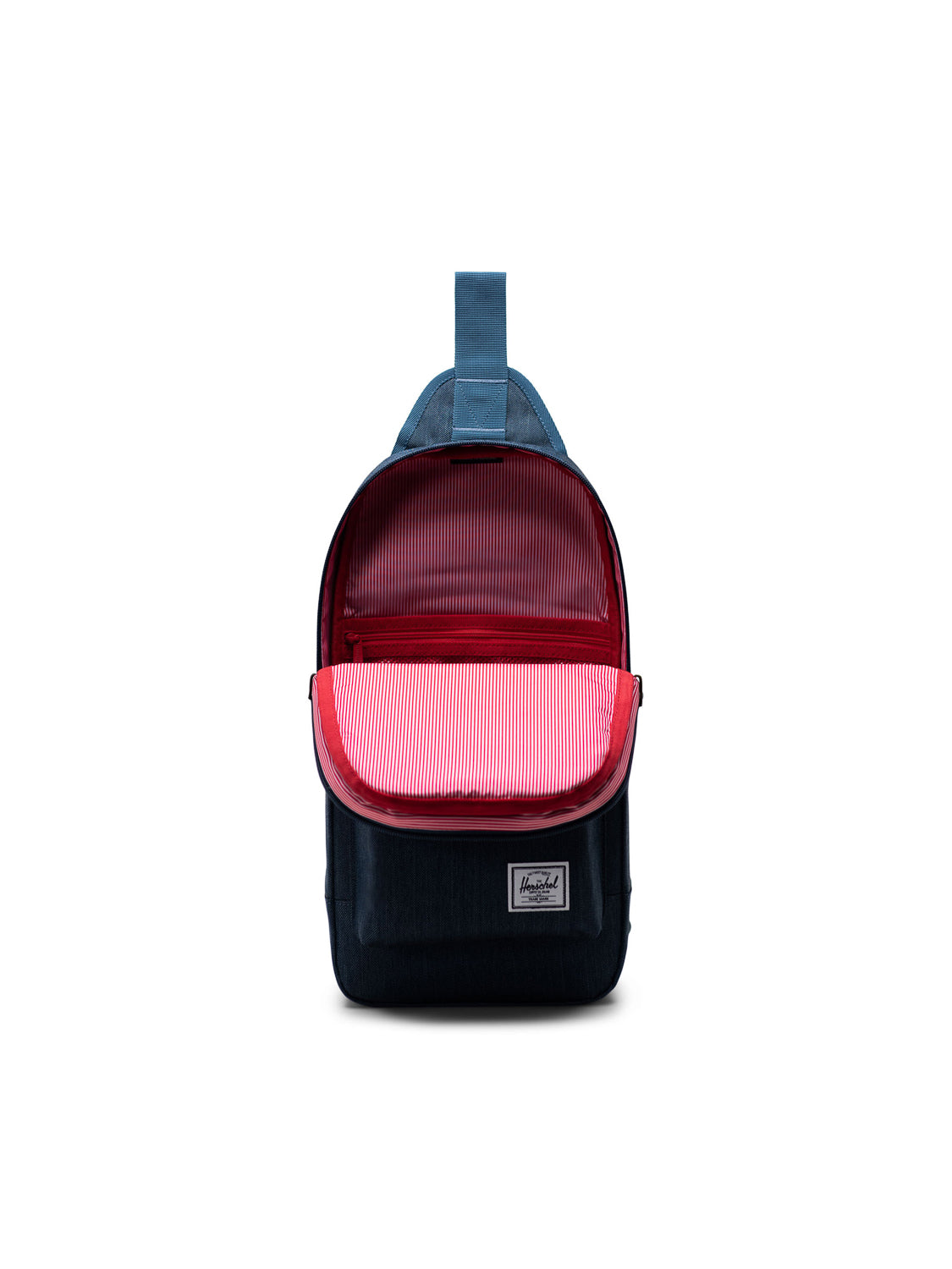 A Herschel Heritage Shoulder Bag in navy blue features a top handle and a front-facing view. The main compartment is open, displaying a red and white striped interior, and a white rectangular Herschel logo patch is on the front pocket.