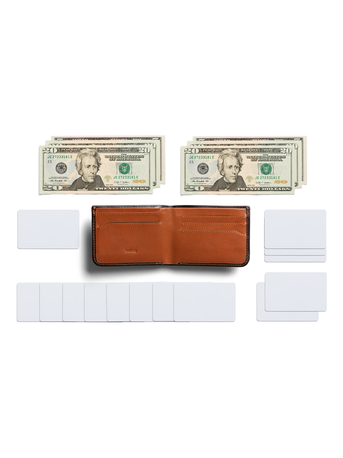 The Bellroy Hide and Seek Low Wallet, crafted from eco-tanned leather, is open on a white background, flanked by two stacks of $20 bills and several neatly arranged blank white cards.