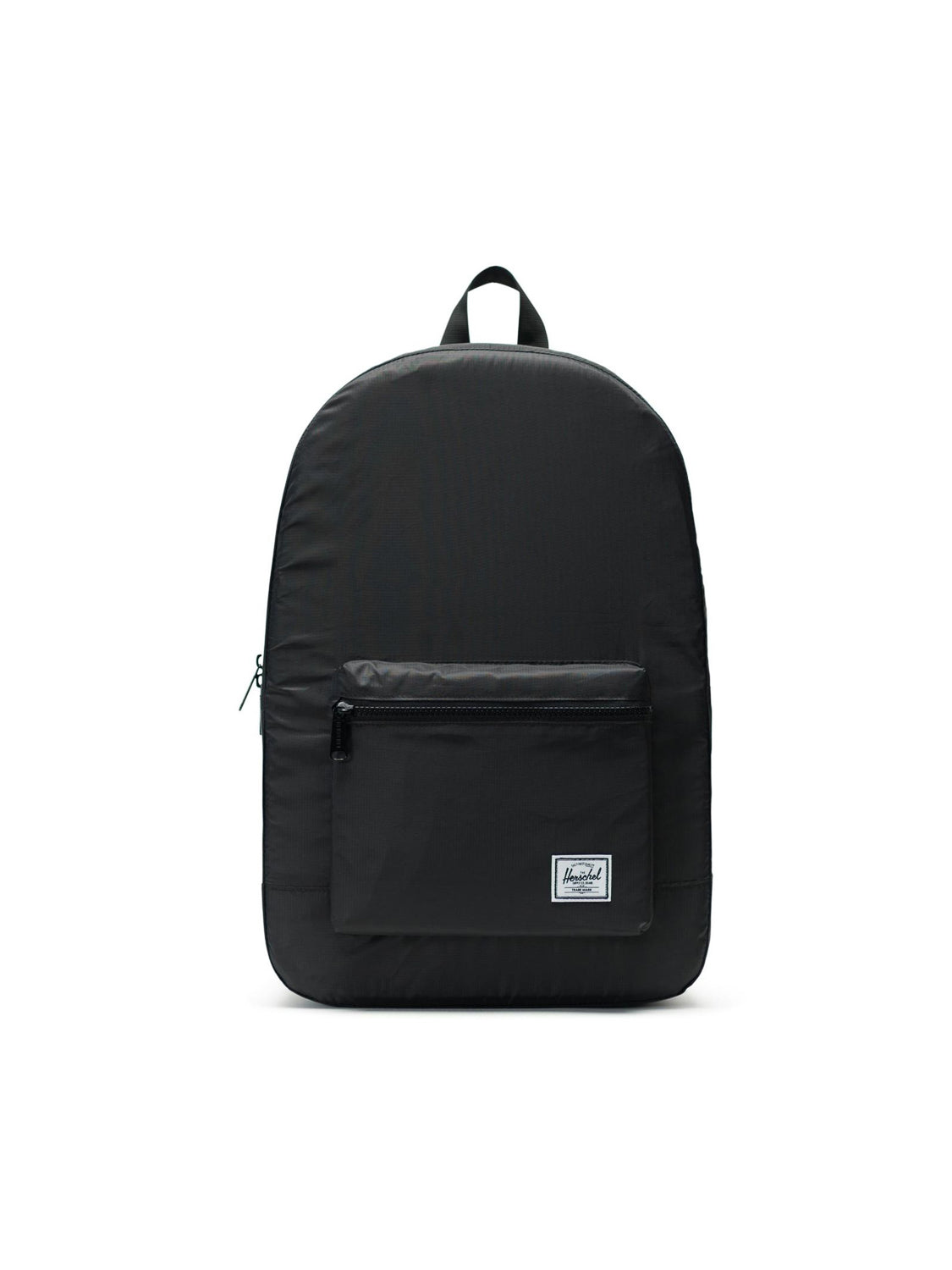 The Herschel Packable Daypack is a lightweight black ripstop backpack with a front zip pocket, small top handle, adjustable shoulder straps, and a white rectangular logo patch on the lower front, shown on a white background.