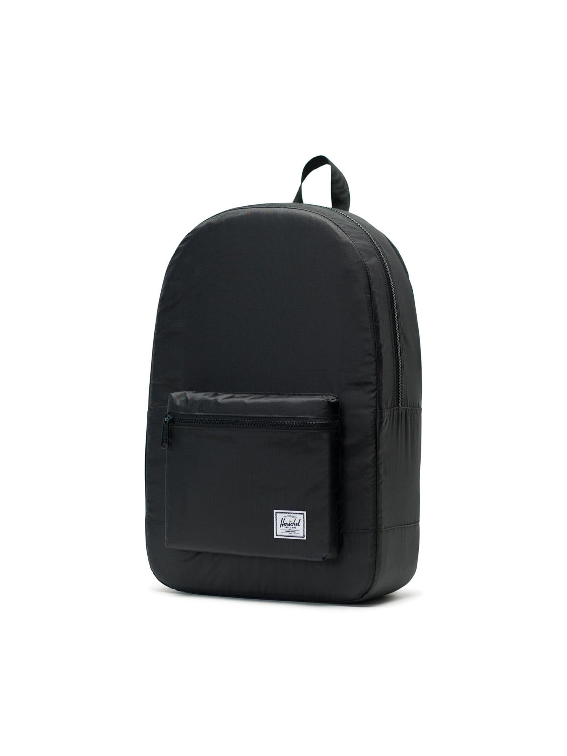 The Herschel Packable Daypack by Herschel is a black daypack featuring a front zippered pocket, white rectangular logo patch, adjustable shoulder straps, and a top handle, shown against a plain white background.