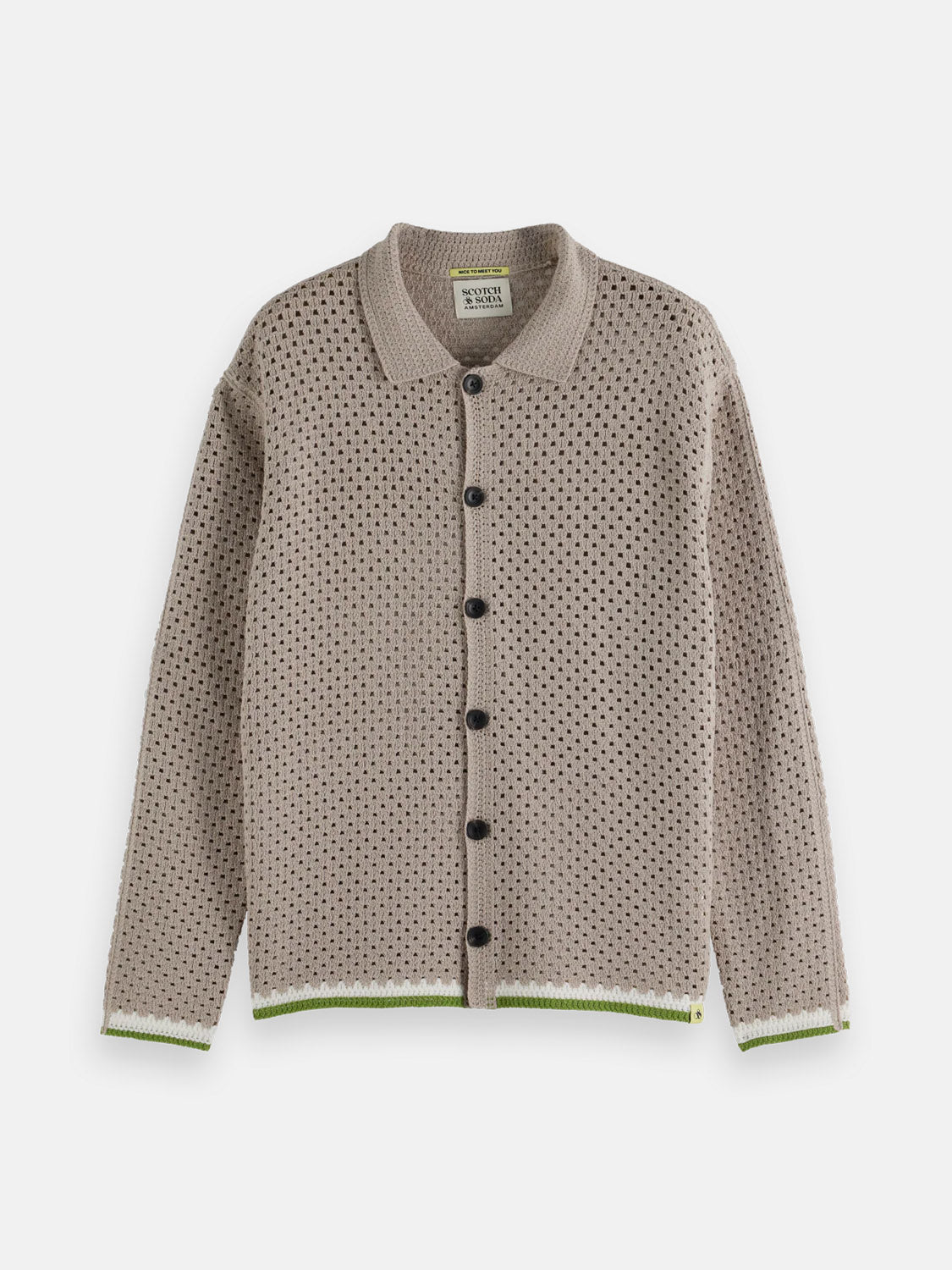 The SCOTCH AND SODA Crochet Long Sleeve Shirt 180084 SU25 features a beige crochet knit, black buttons, a collar, and long sleeves, with white and green hem stripes for a pop of color to this creative, neutral piece.