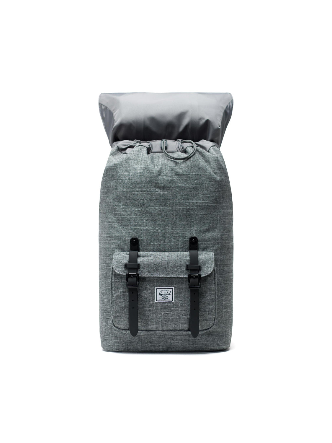 A Herschel Little America Iconic Backpack in grey fabric, featuring black buckle straps, a front pocket, a laptop sleeve, and a white logo patch, photographed against a plain white background.