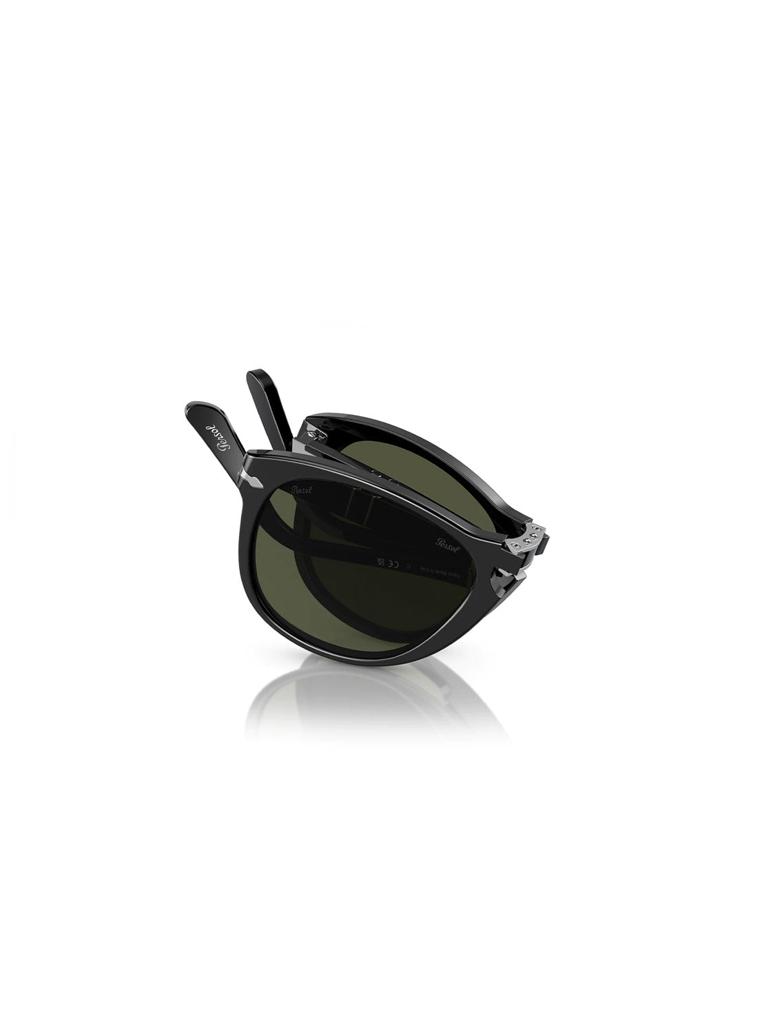 The Persol PO714 features a sleek design with black folding glasses, glossy acetate frames, and metal hinges, highlighted against a white background. They have green-tinted crystal lenses and are crafted by Persol.
