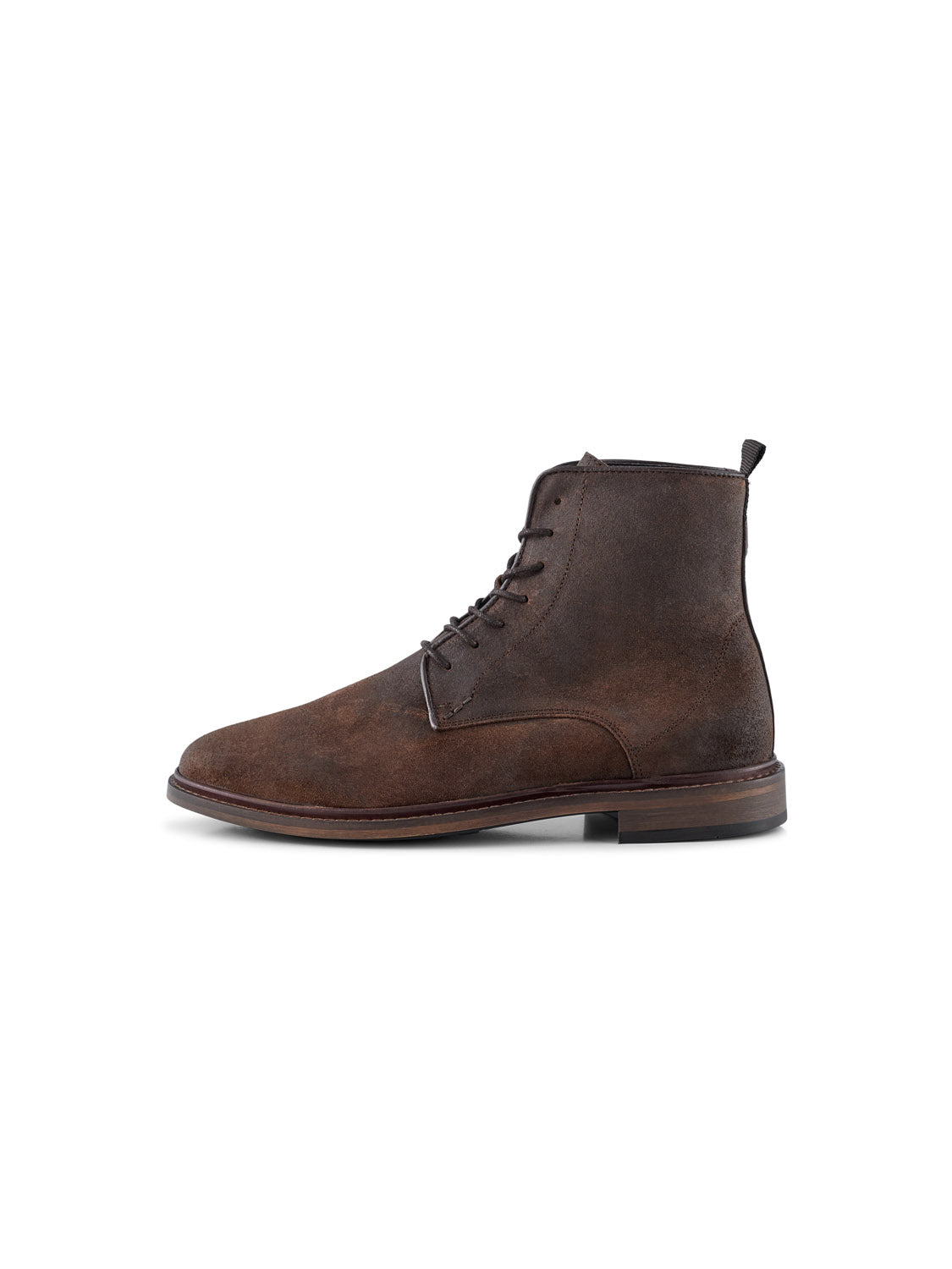 The Ned Suede Waxed Boot by Shoe The Bear is a brown leather lace-up featuring a rounded toe, textured finish, pull tab, and sturdy sole. Handmade in Portugal for exceptional quality. Seen from the side on a white background.