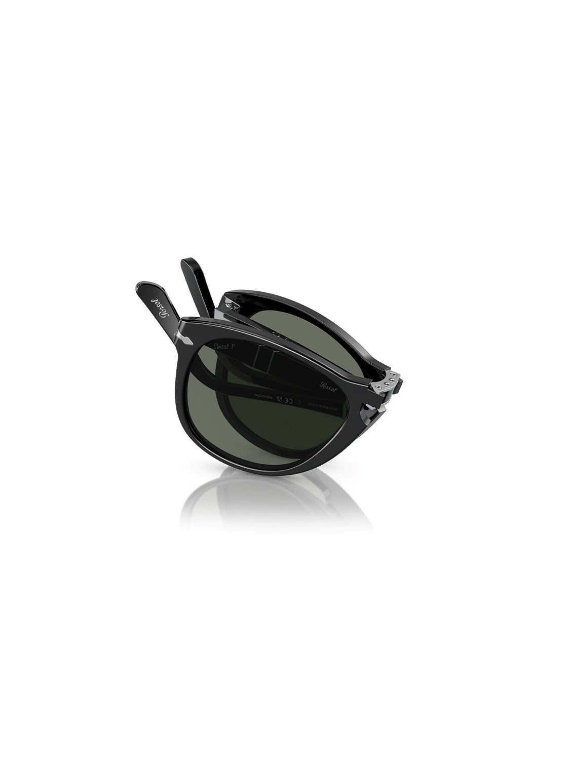 The partially folded Persol - PO714 sunglasses, featuring sleek black acetate frames and green crystal polarized lenses, sit elegantly on a reflective white surface.