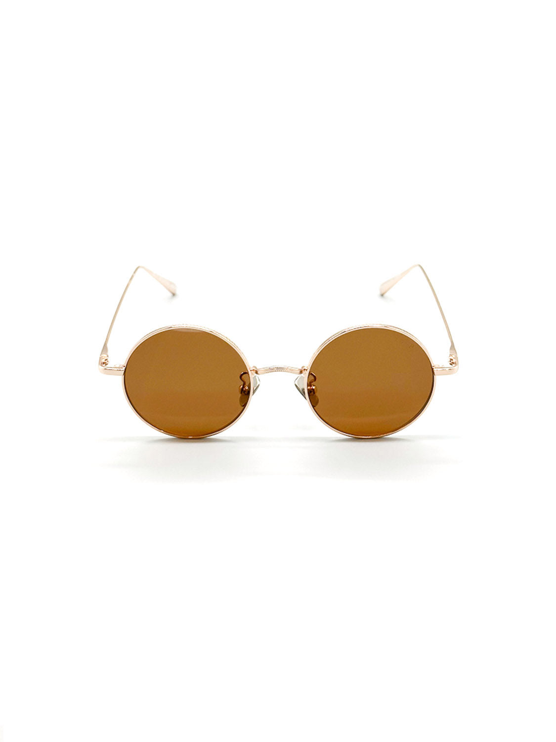 The M426B ID Polarized Sunglasses by ID Menswear feature bronze-tinted, polarized lenses offering UV400 protection and minimalist round gold frames. Theyre showcased on a white background.