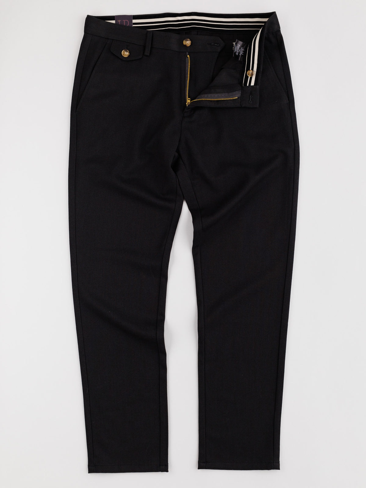 These Kensington Wool Blend Chino trousers by ID Menswear feature a white waistband detail and partially open zipper, showcasing timeless style. Laid on a white background, they highlight front pockets and a button closure for the perfect fit.