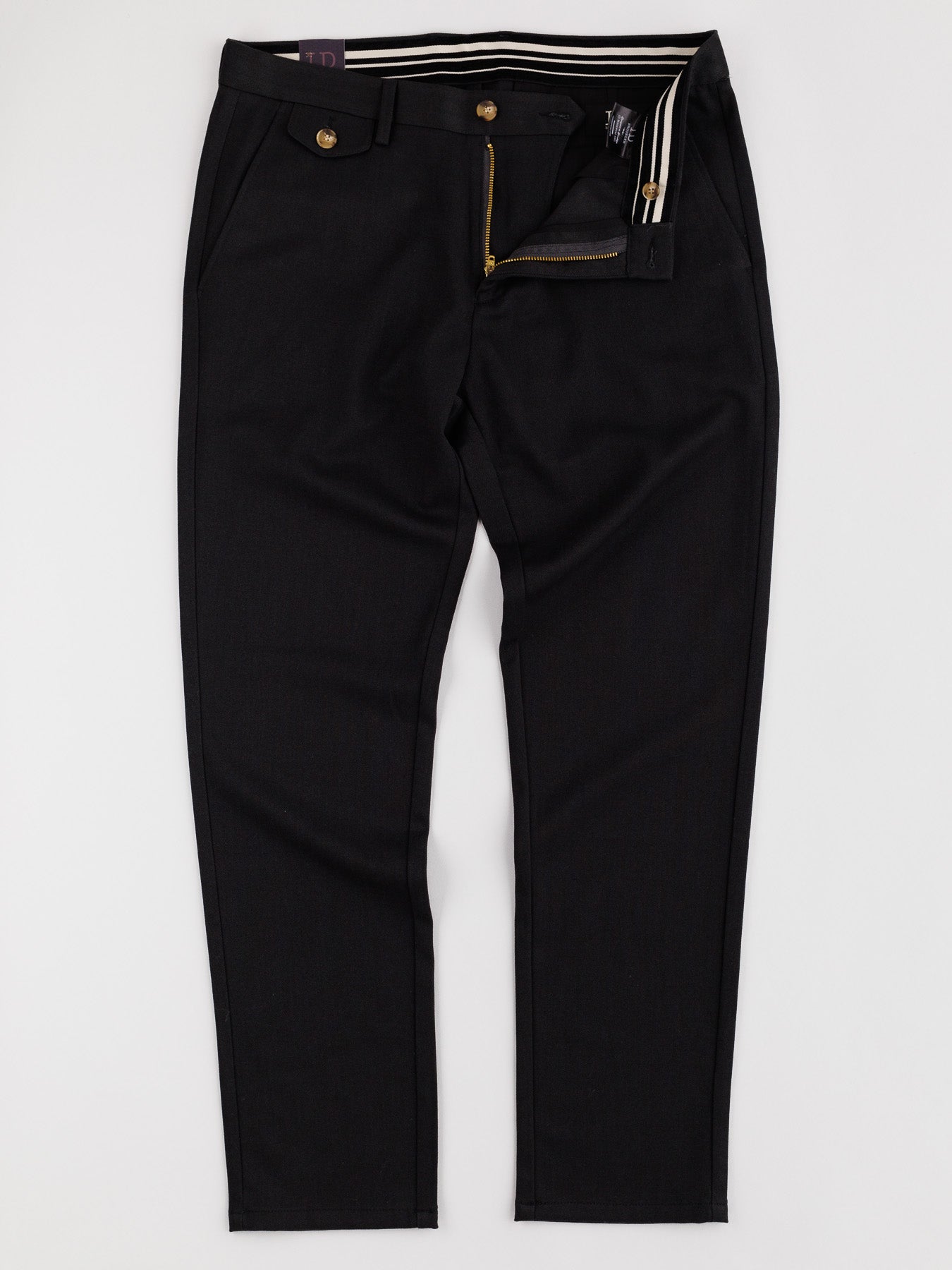 These Kensington Wool Blend Chino trousers by ID Menswear feature a white waistband detail and partially open zipper, showcasing timeless style. Laid on a white background, they highlight front pockets and a button closure for the perfect fit.