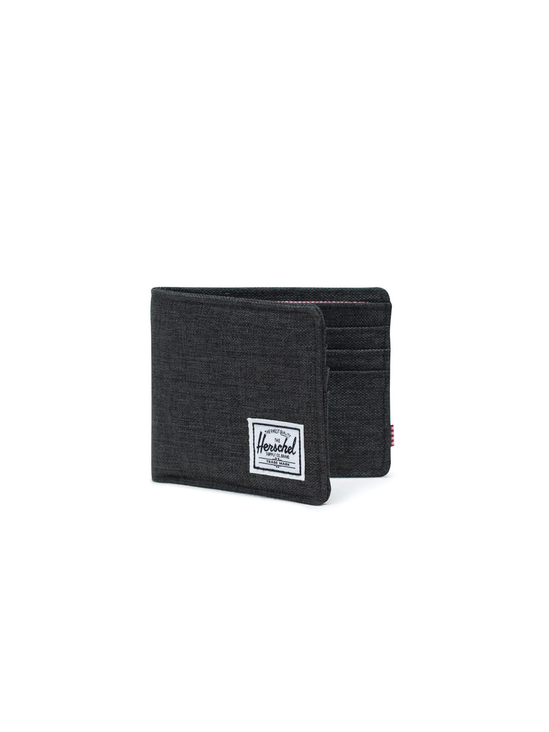 The Herschel Roy Classic Folded Wallet in black features a white logo patch on the front, multiple card slots, and a minimalist design. Photographed on a white background.