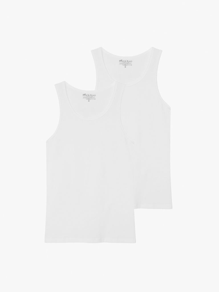 Against a white background, the Bread & Boxers 2 Pack Tank Top Cotton Stretch by Bread & Boxer are sleeveless, plain white shirts with round necklines. They feature a simple, basic design ideal as a base layer.