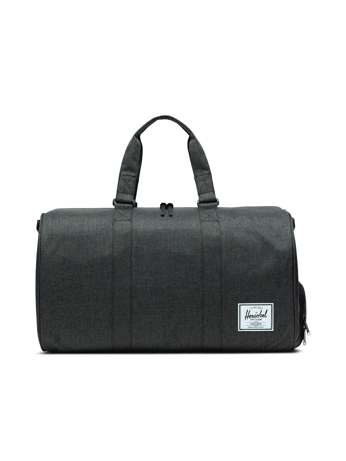 The Herschel Novel Weekender Duffle Bag in black features two handles, a zipper, a front white brand label, and a signature shoe compartment. Stylishly designed, it's shown against a white background.