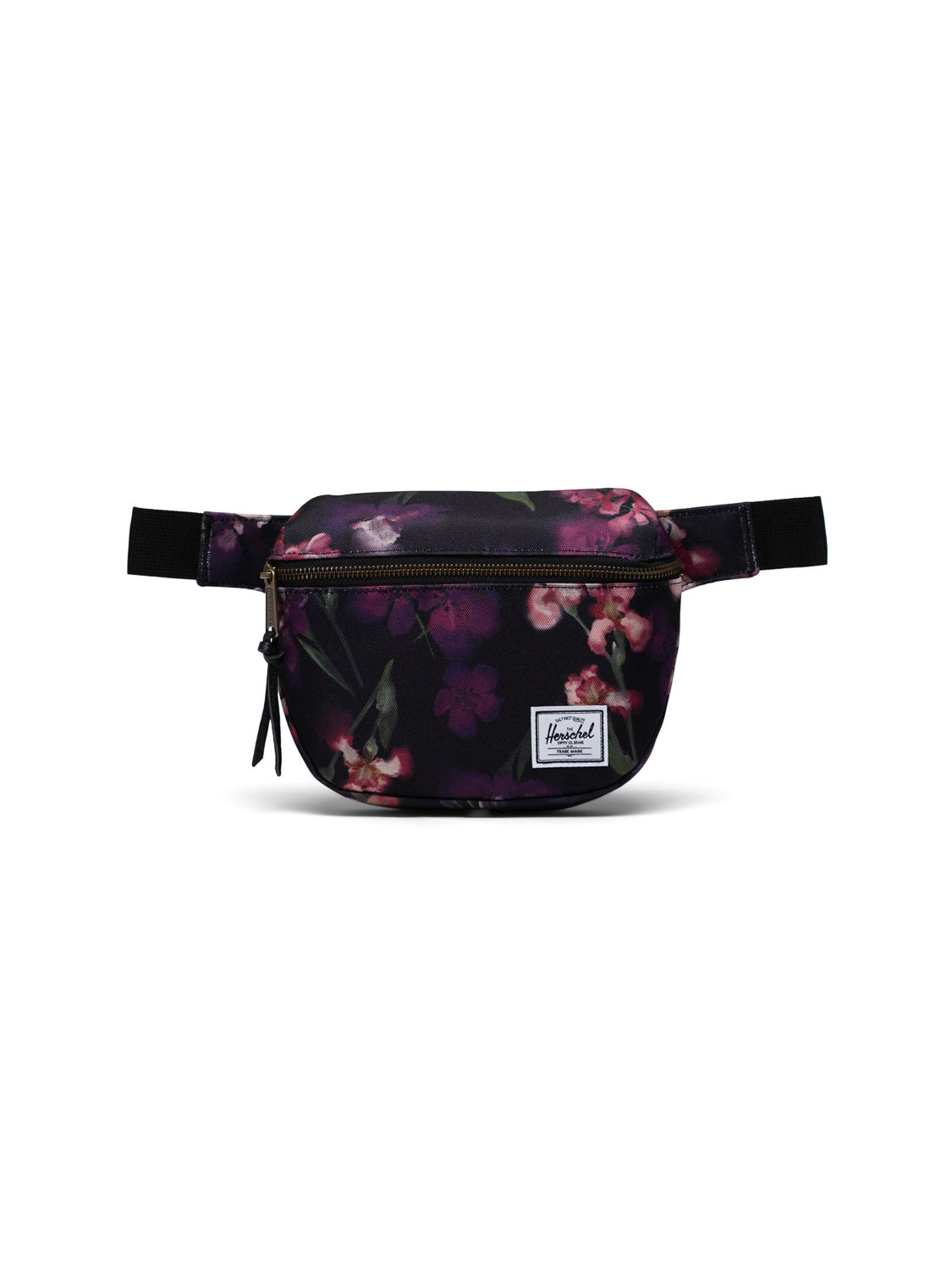 The Herschel Fifteen Hip Pack features a floral pattern on a dark background, a metal zipper, adjustable strap, and a small white rectangular Herschel label on the front.