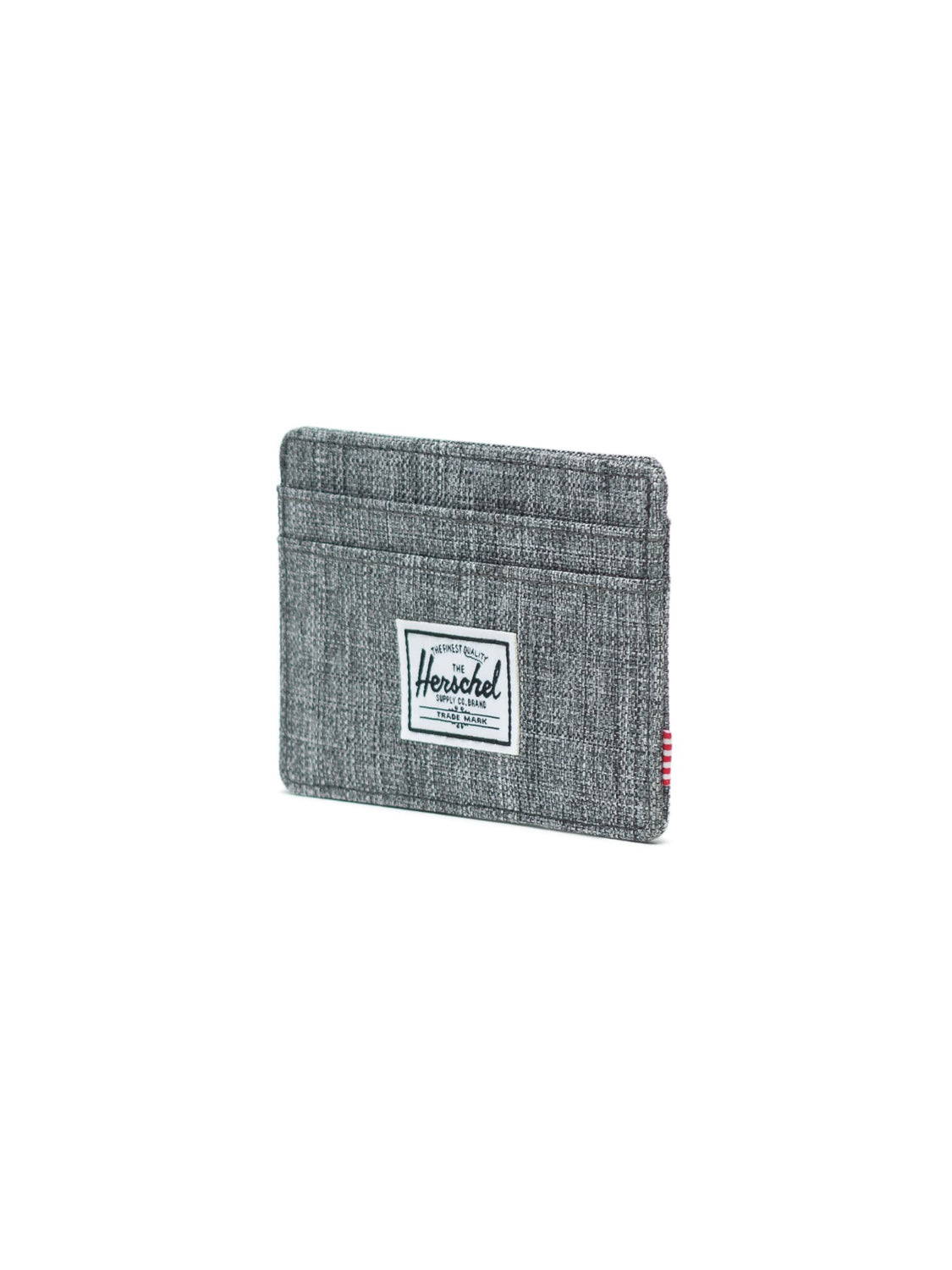 The Herschel Charlie Compact Card Holder Wallet is a gray fabric wallet with RFID blocking, a white Herschel label front, several card slots, and a red-and-white striped side tag.