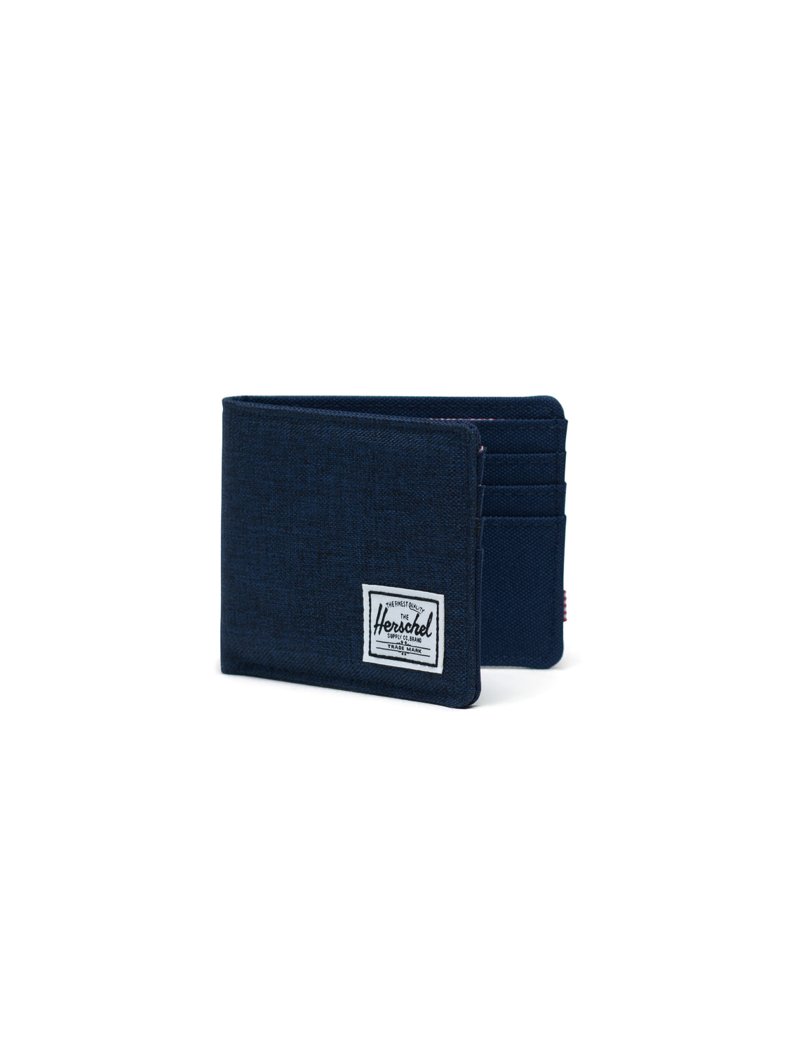 The Herschel Roy Classic Folded Wallet in navy blue features RFID blocking, multiple card slots, and a white rectangular Herschel label on the front, displayed against a plain white background.