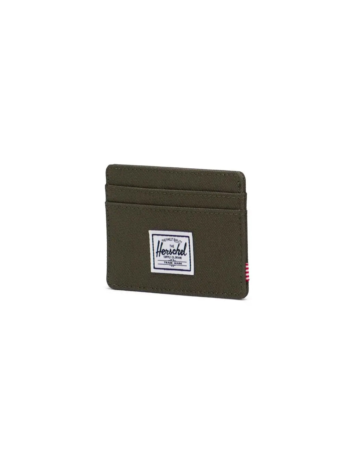 The Herschel Charlie Compact Card Holder Wallet in green features RFID blocking, two card slots, and a white rectangular Herschel logo patch on the front, shown against a plain white background.