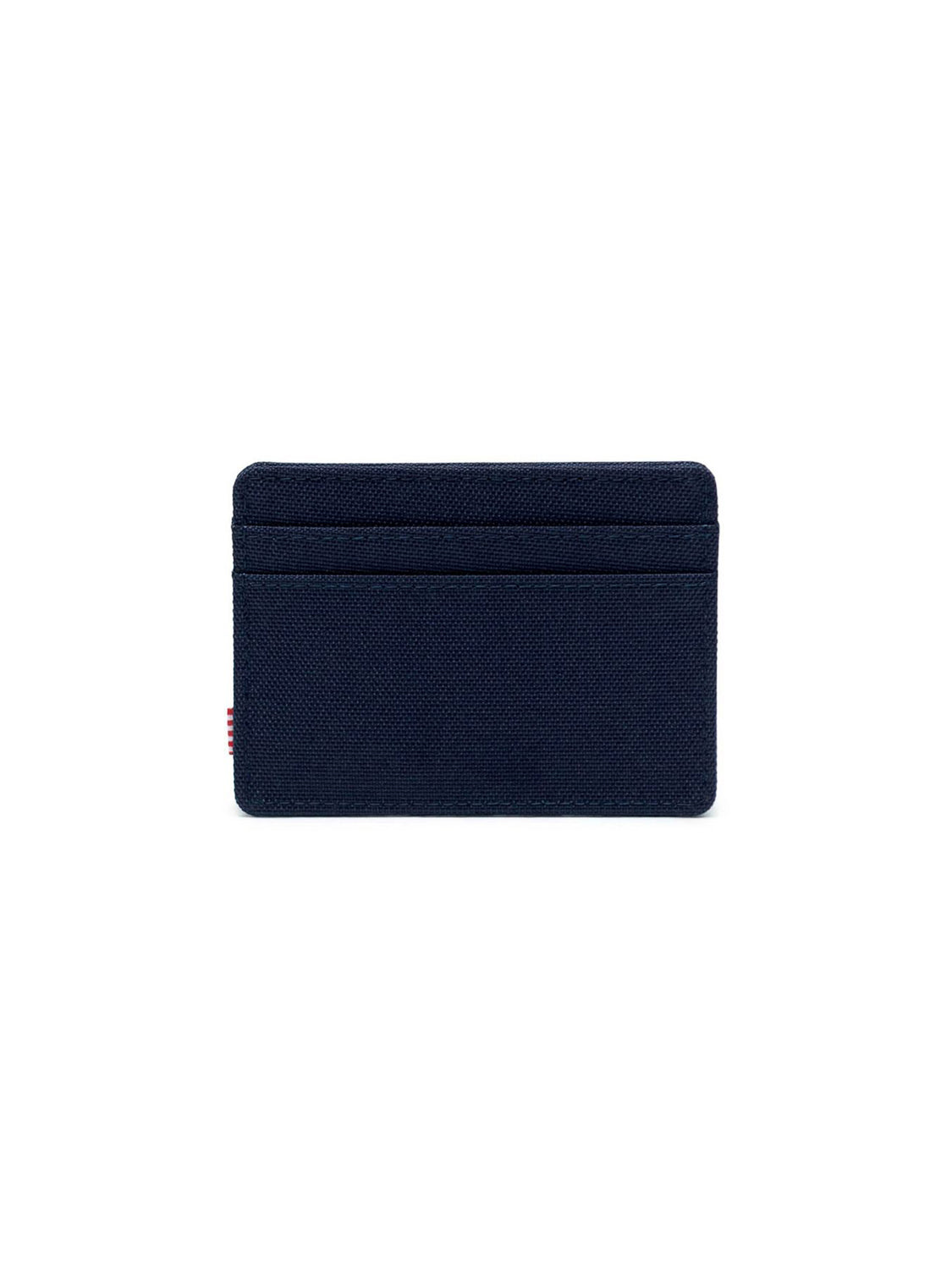 The Herschel Charlie Compact Card Holder Wallet, shown upright on a plain white background, features a minimalist navy blue fabric design with RFID blocking and two card slots.