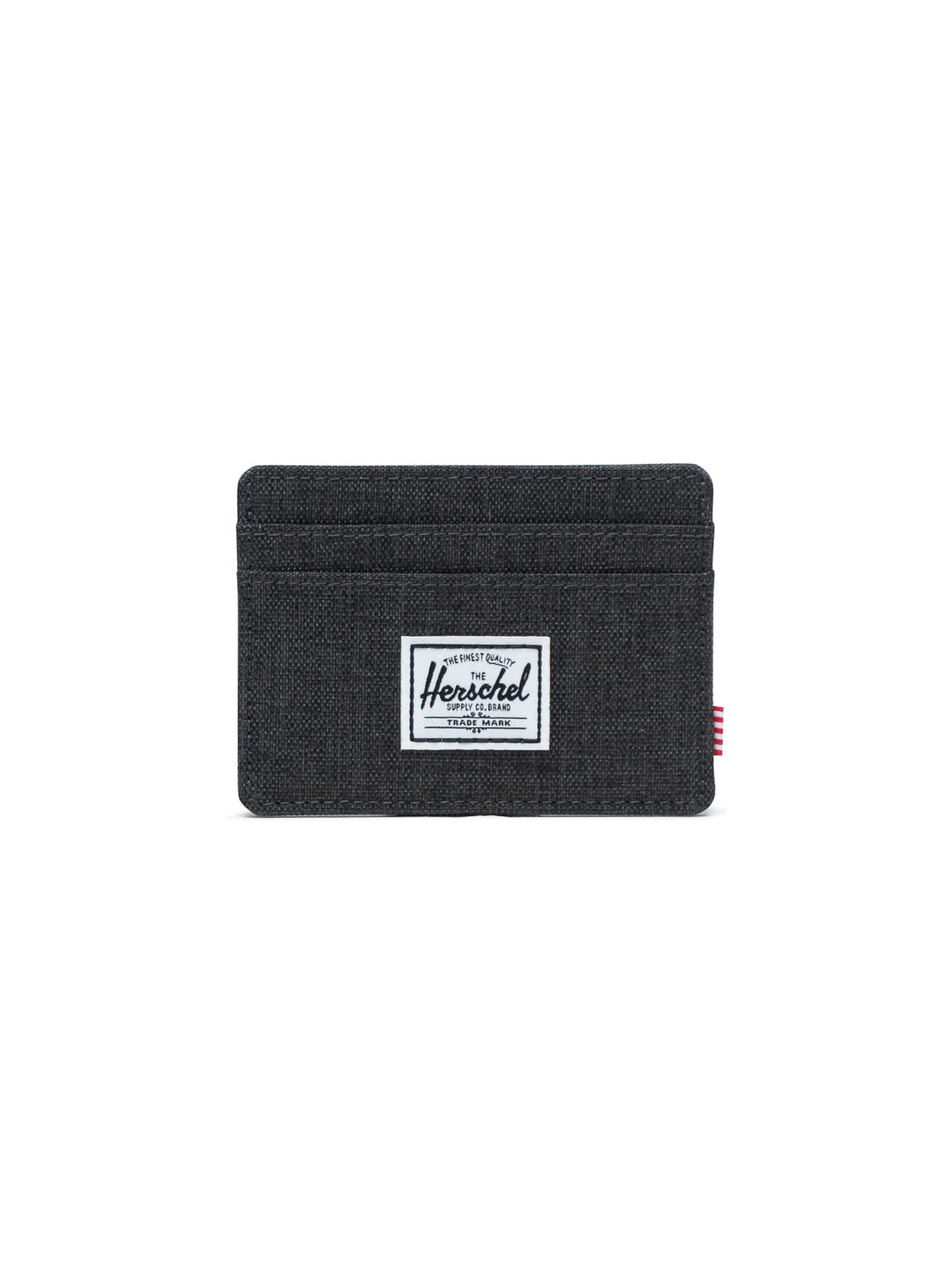 The Herschel Charlie Compact Card Holder Wallet features multiple card slots, black fabric construction, and a white rectangular Herschel logo patch on the front center, shown against a plain white background.