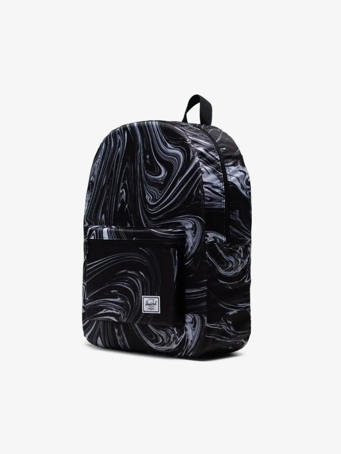 The Herschel Packable Daypack by Herschel is a black daypack with a swirling white and gray marble pattern, front zip pocket, adjustable shoulder straps, top handle, and a small white rectangular logo patch. Minimalist and easy to carry.