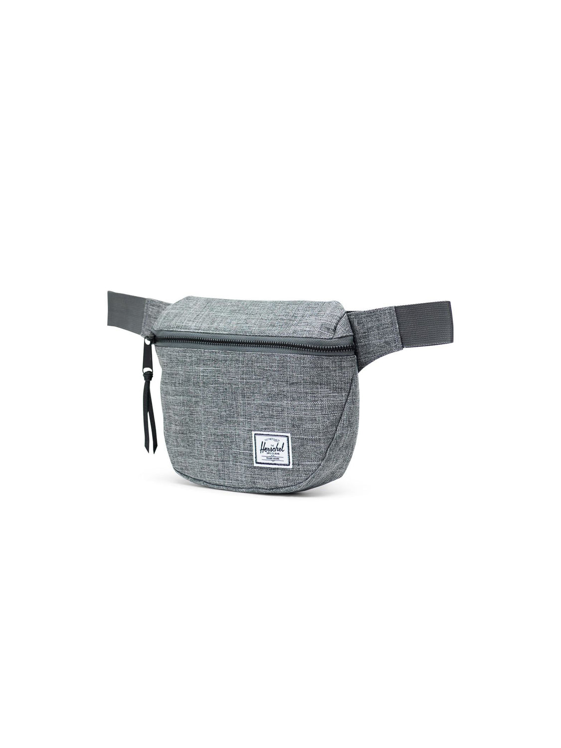 The Herschel Fifteen Hip Pack is a gray fabric bag with a black adjustable strap, metal zipper, and a small white rectangular logo patch on the front, shown photographed against a white background.