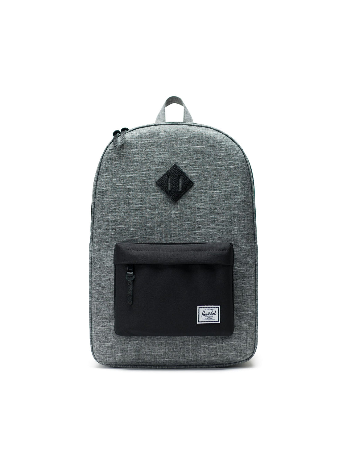 The Herschel Heritage Backpack is gray with a black front pocket, black zipper, small top handle, and rectangular logo label. It features a laptop sleeve and is shown against a white background.