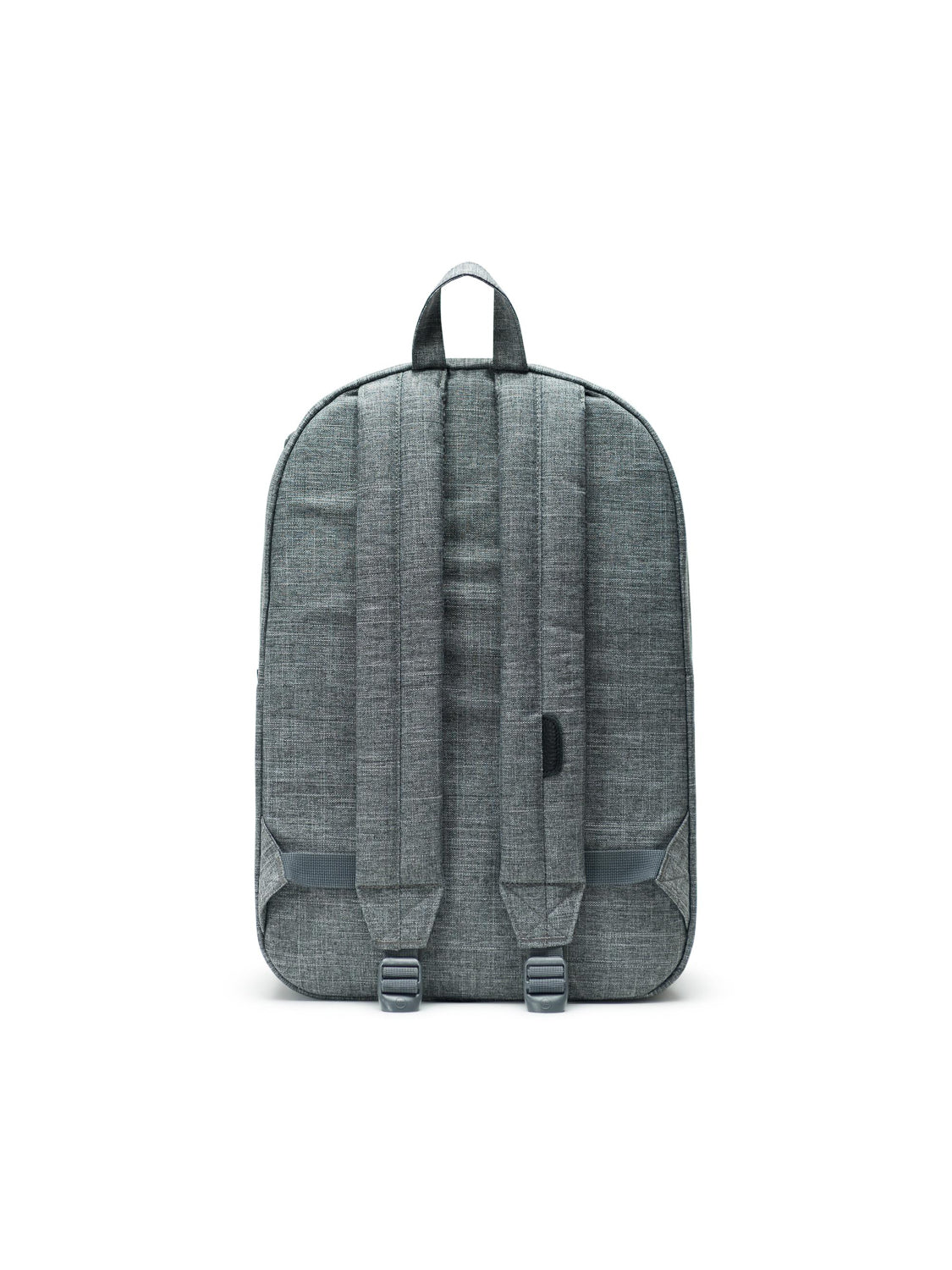 The Herschel Heritage Backpack is displayed in gray fabric, showcasing two padded shoulder straps, a top carrying handle, a subtle side USB port, and a laptop sleeve, all designed with classic mountaineering-inspired style.
